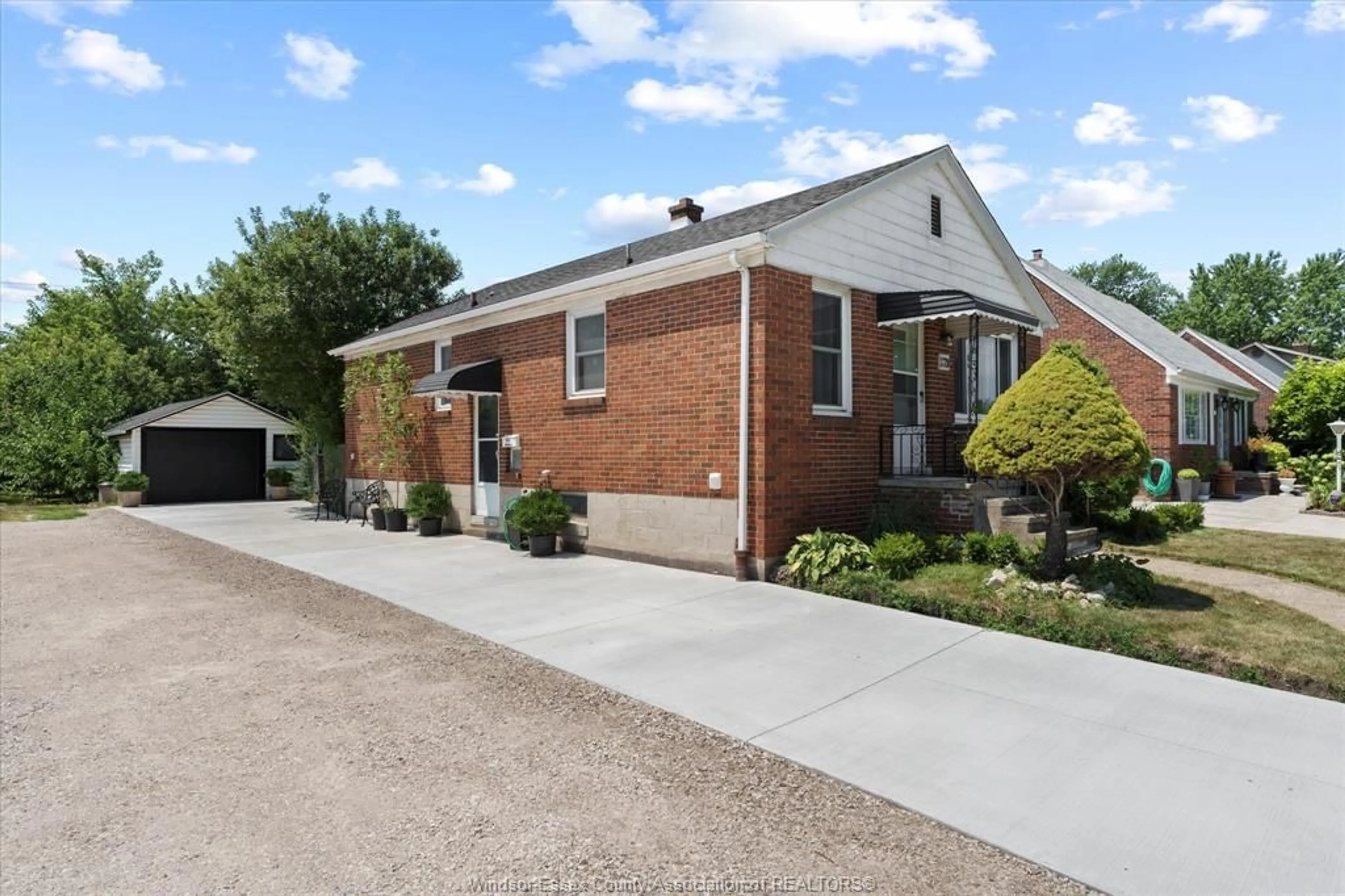 Home with brick exterior material, street for 379 LAUZON Rd, Windsor Ontario N8S 3M1