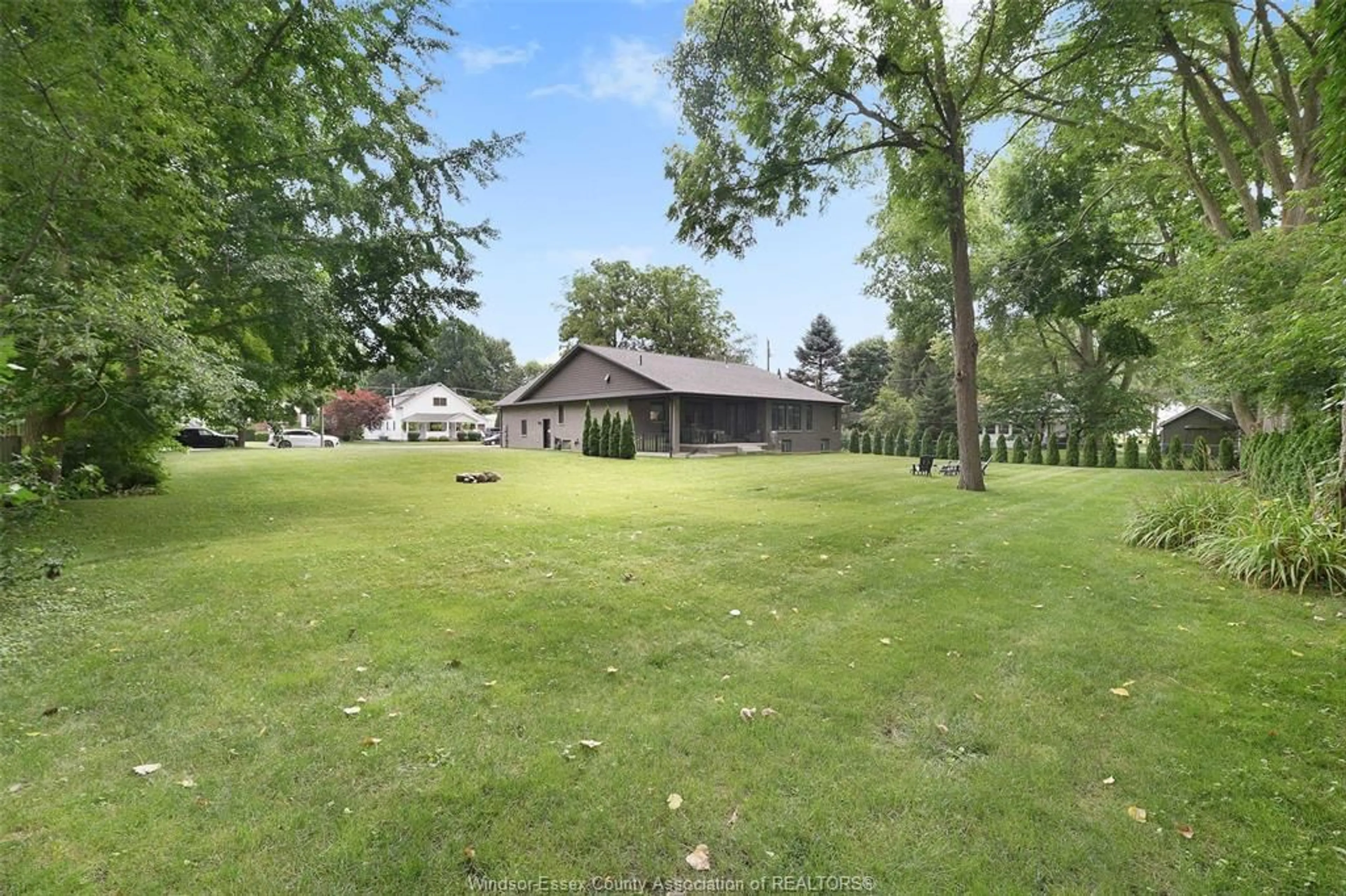 A pic from outside/outdoor area/front of a property/back of a property/a pic from drone, water/lake/river/ocean view for 110 LAUREL St, Kingsville Ontario N9Y 2B4
