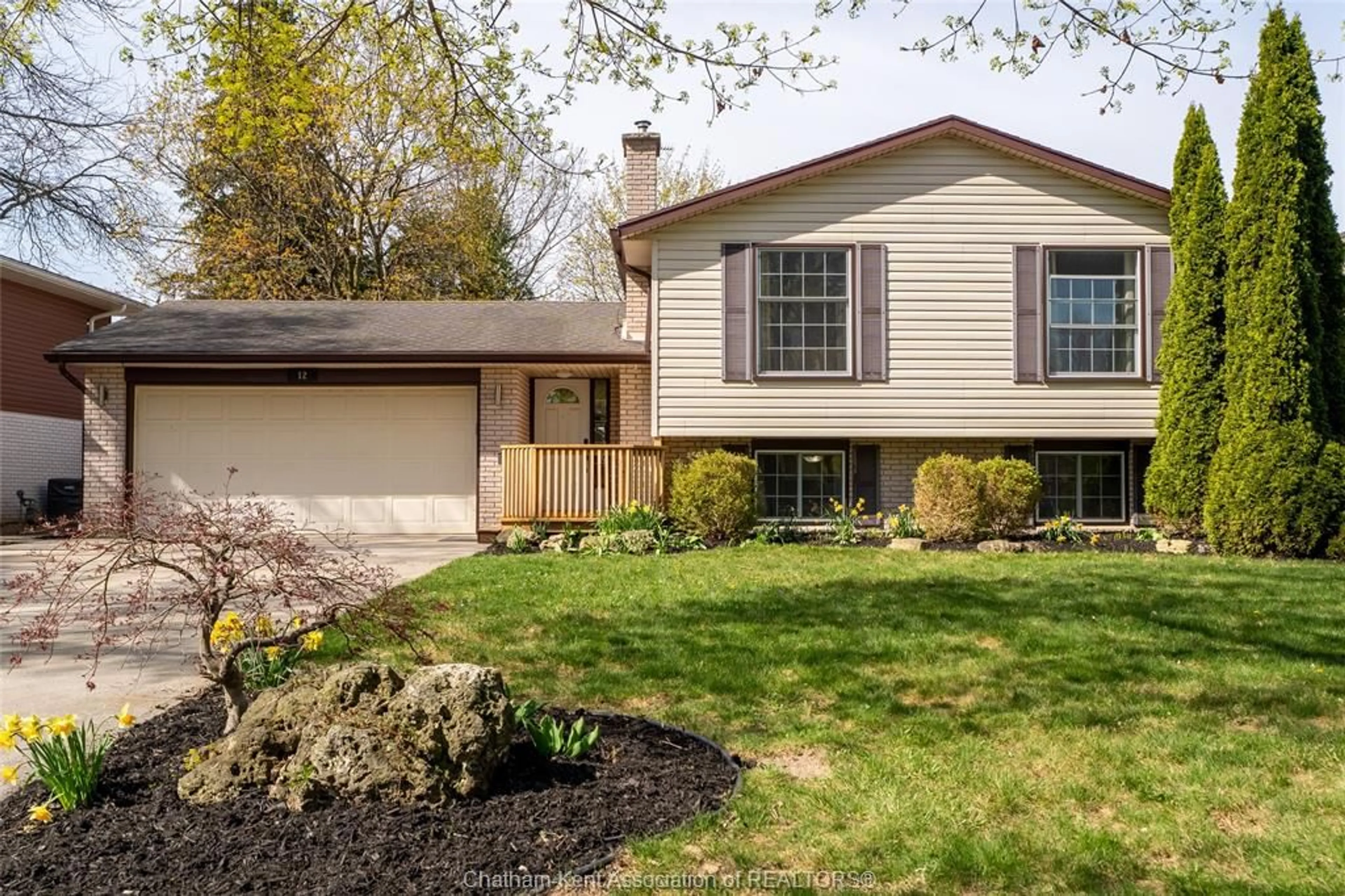 Home with vinyl exterior material, street for 12 Sioux Dr, Chatham Ontario N7M 5S5