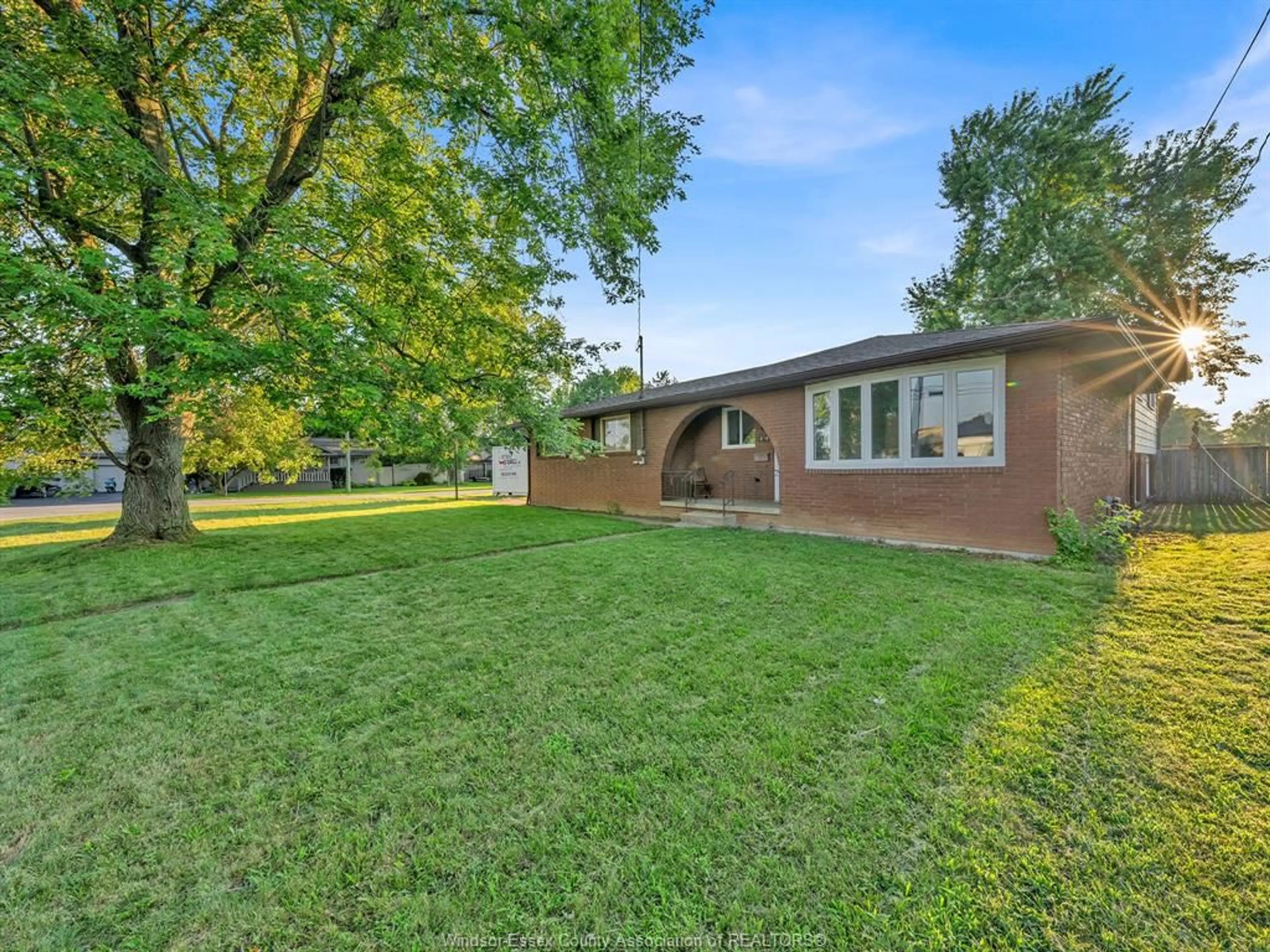 A pic from outside/outdoor area/front of a property/back of a property/a pic from drone, street for 1670 MICHIGAN Ave, LaSalle Ontario N9J 2L6