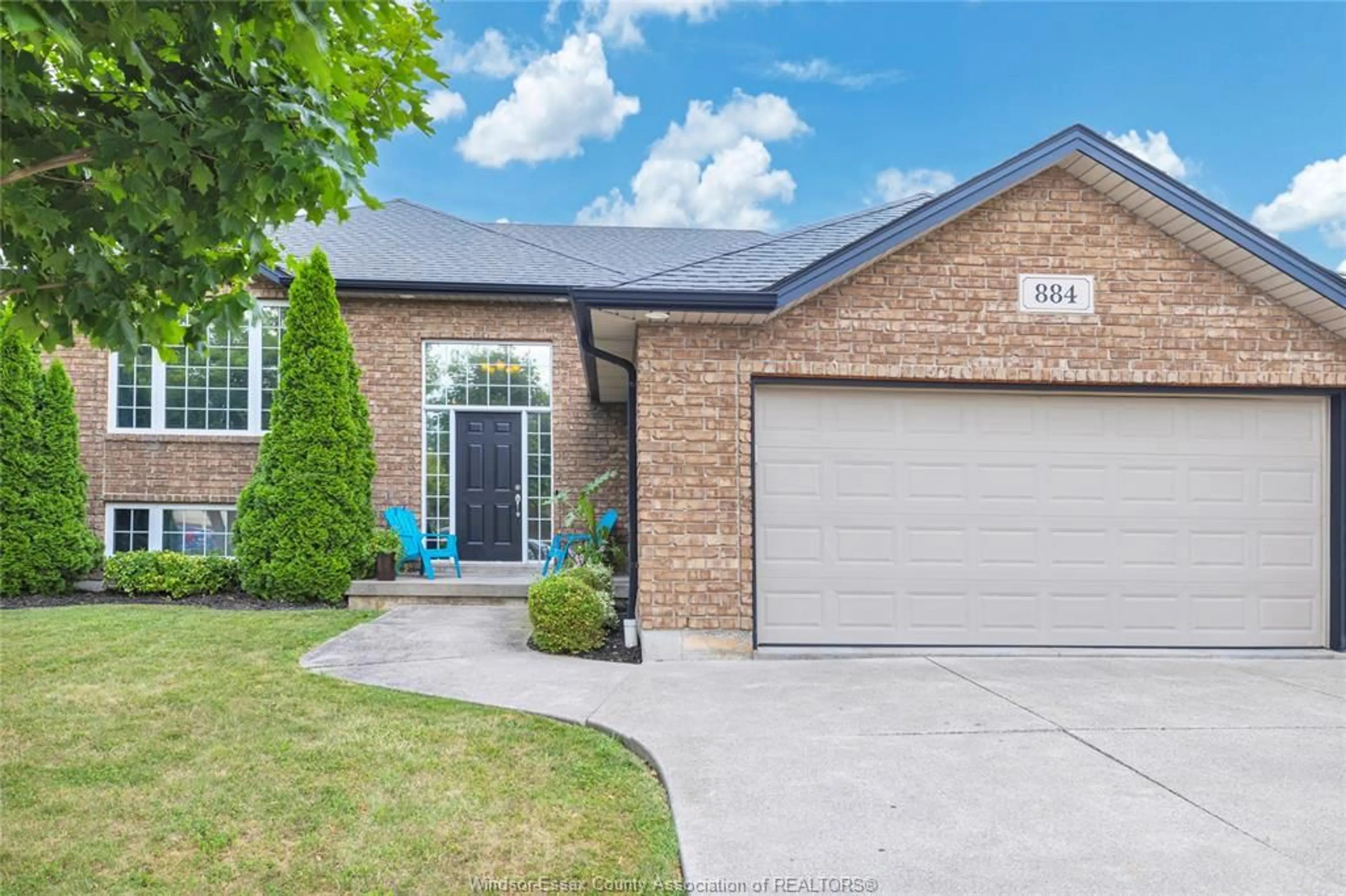 Home with brick exterior material, street for 884 DRIFTWOOD, Lakeshore Ontario N0R 1A0