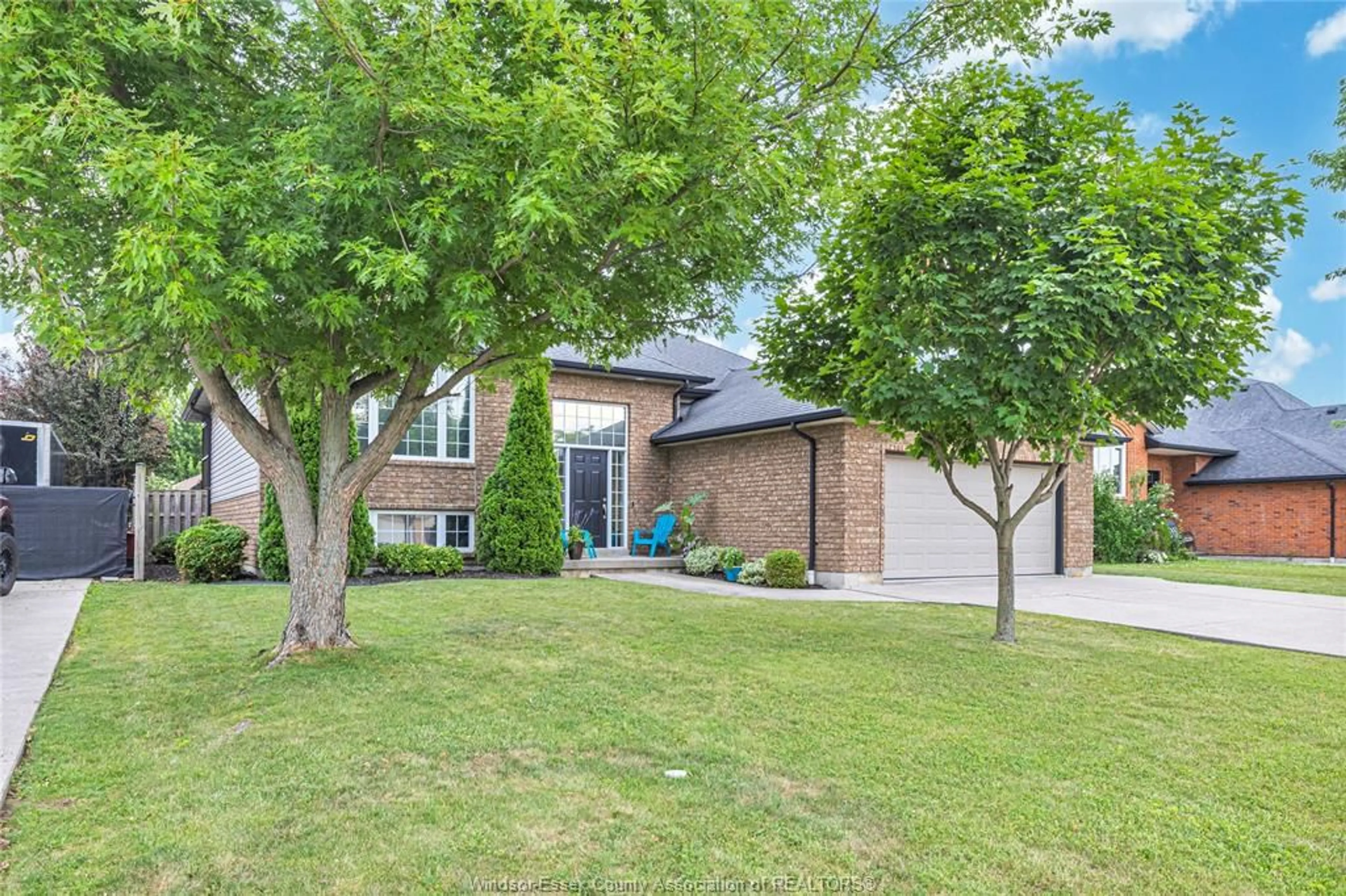 Home with brick exterior material, street for 884 DRIFTWOOD, Lakeshore Ontario N0R 1A0