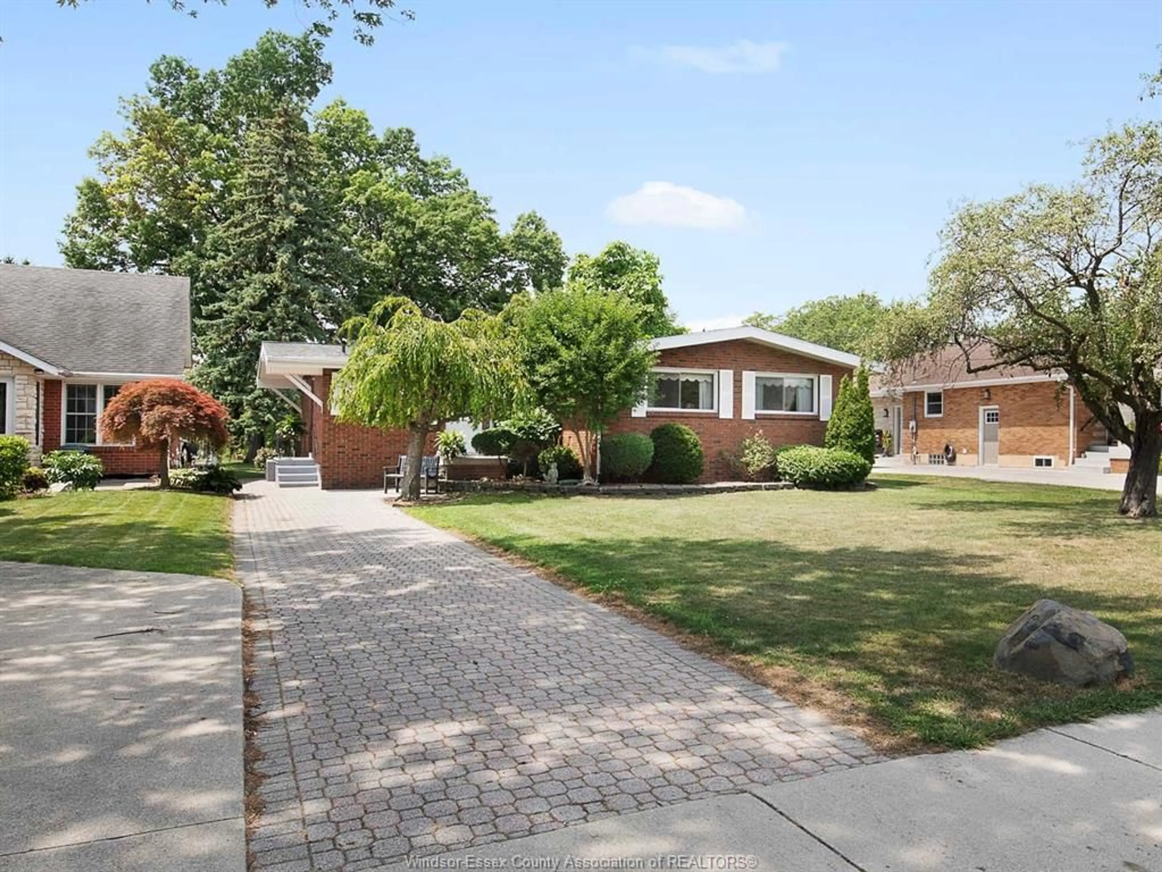 Home with brick exterior material, street for 841 Lacasse, Tecumseh Ontario N8N 2C3