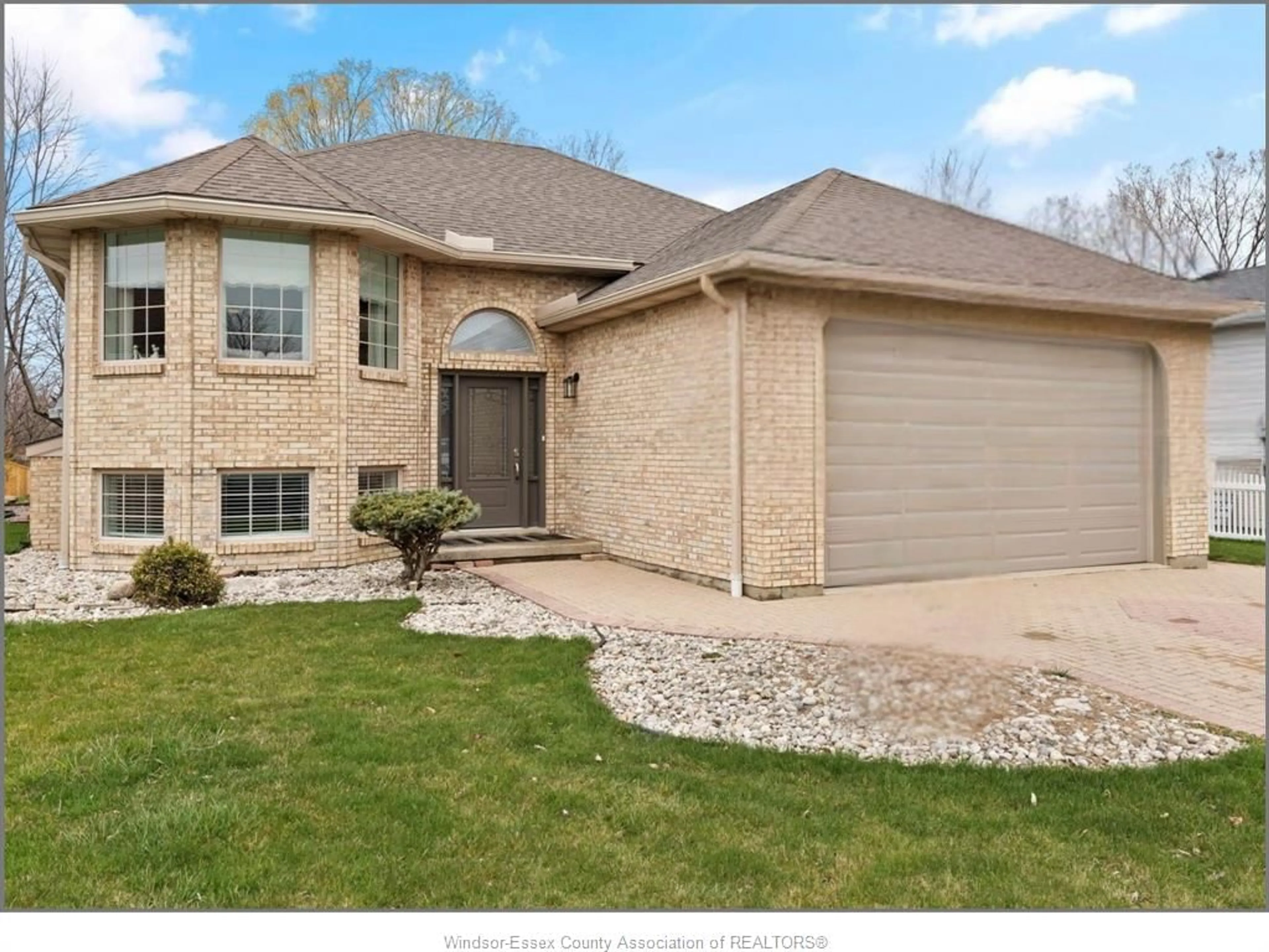Home with brick exterior material, street for 36 Rose Ave, Tilbury Ontario N0P 2L0