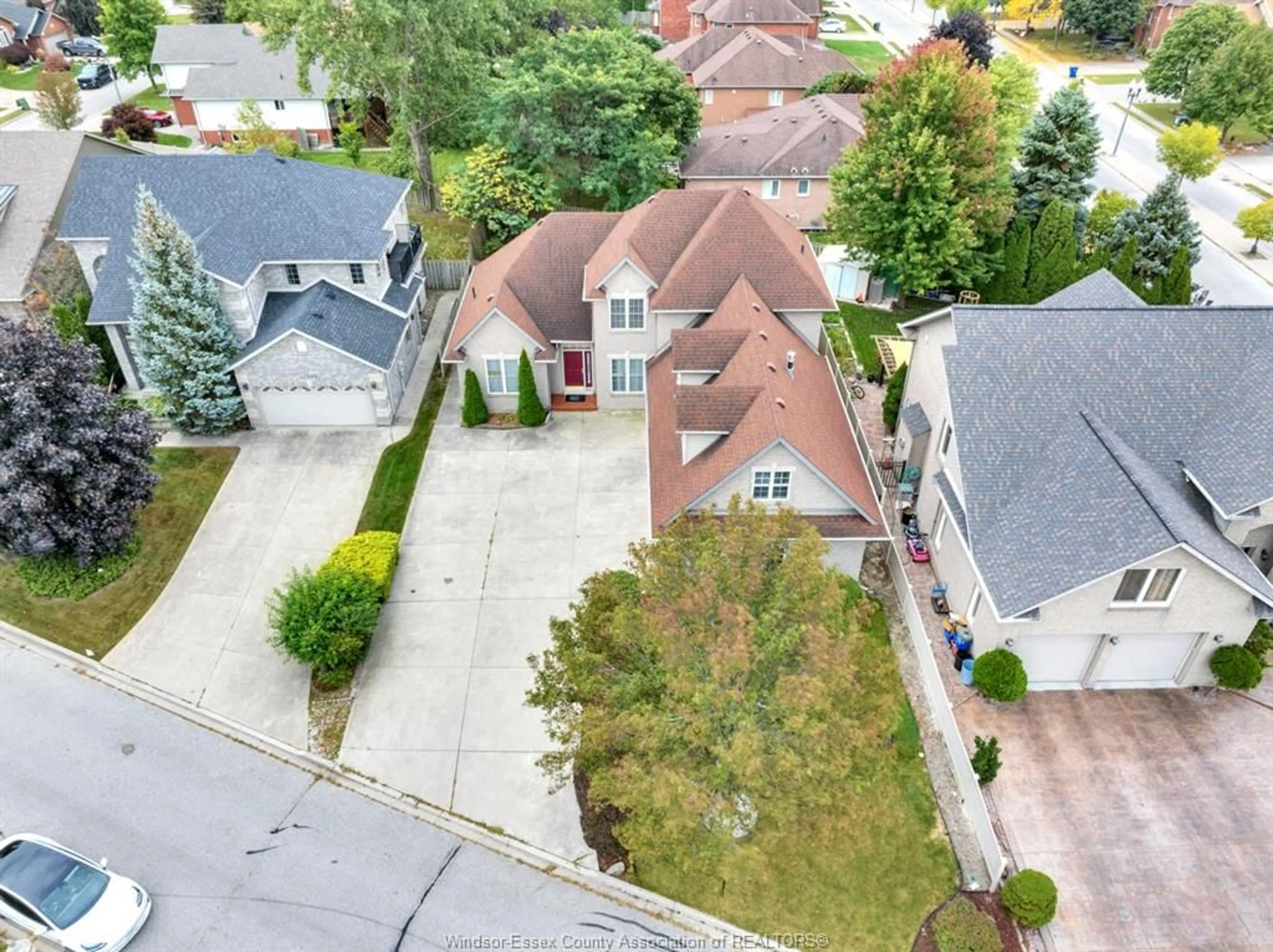 A pic from outside/outdoor area/front of a property/back of a property/a pic from drone, street for 11341 AMALFI DR. Dr, Windsor Ontario N8P 1J8