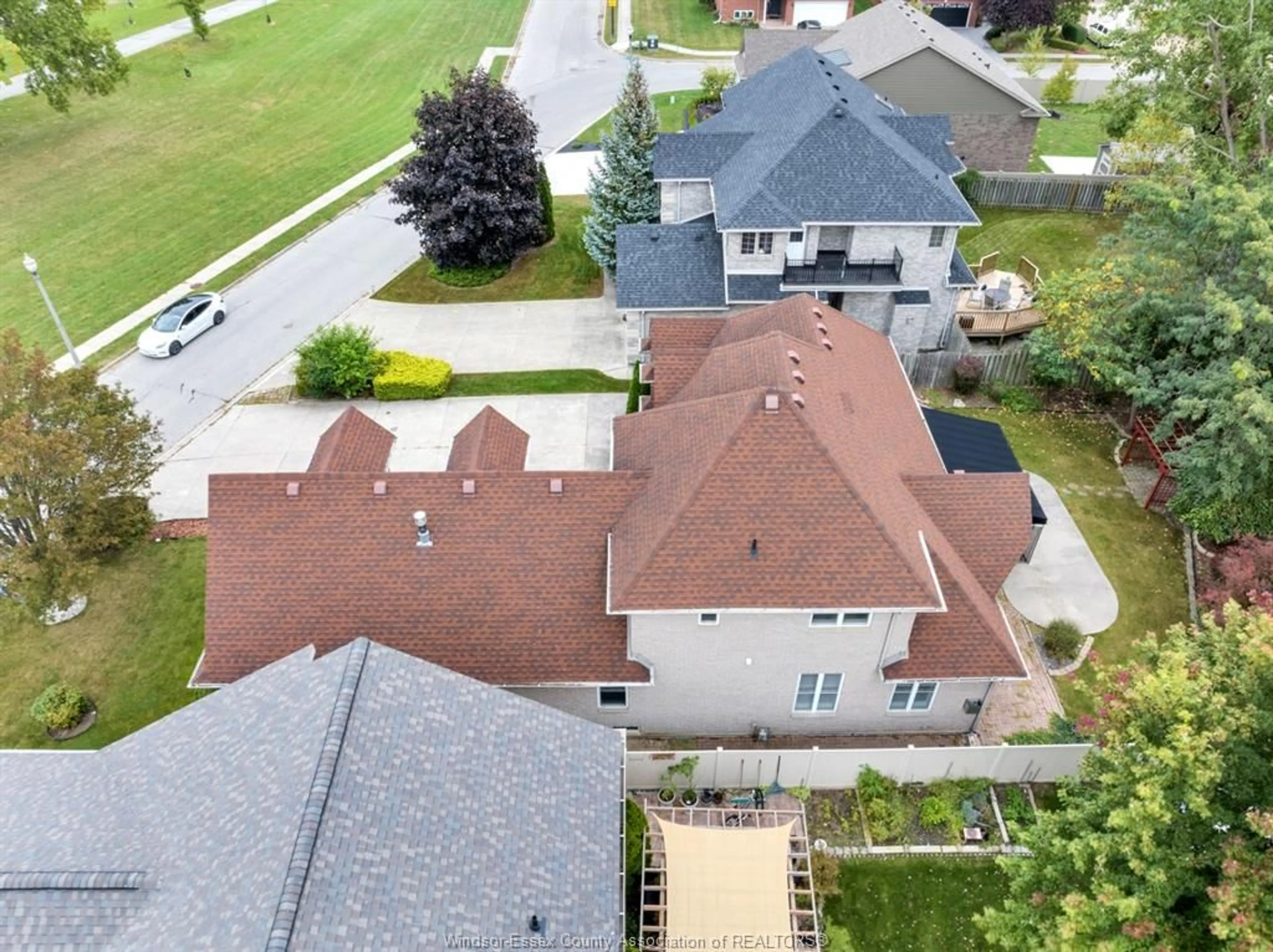 A pic from outside/outdoor area/front of a property/back of a property/a pic from drone, street for 11341 AMALFI DR. Dr, Windsor Ontario N8P 1J8