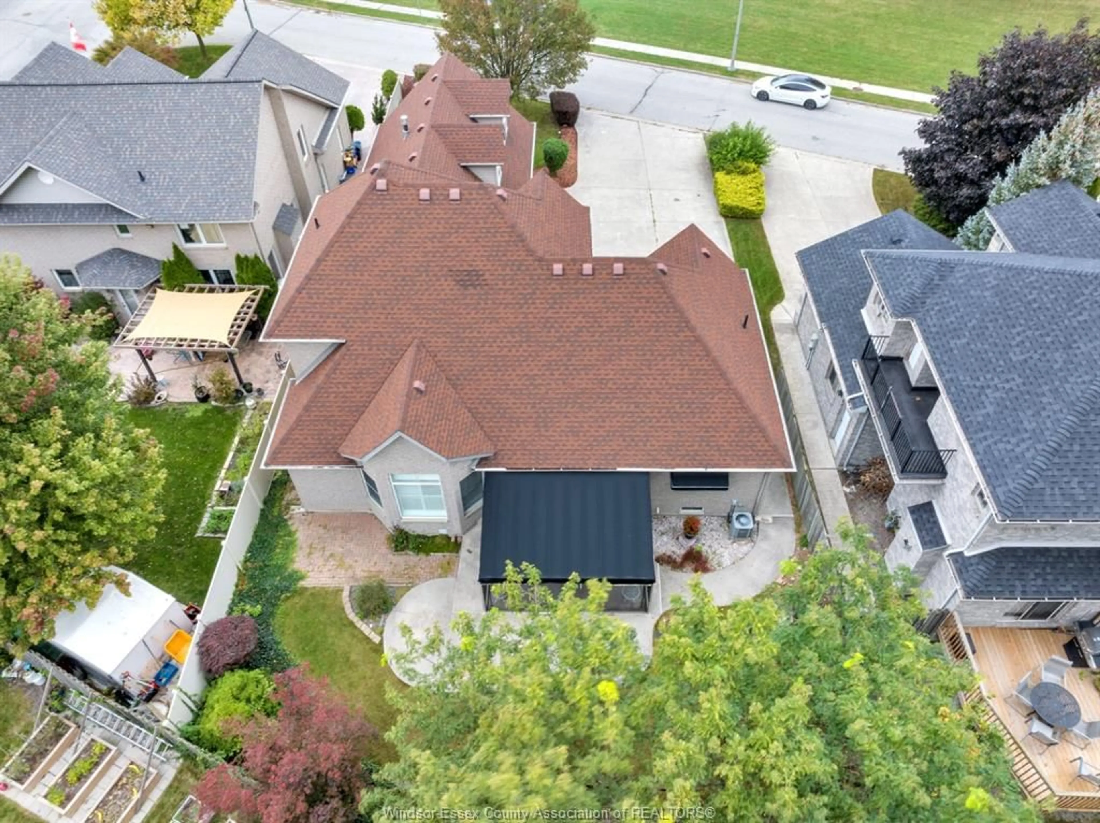 A pic from outside/outdoor area/front of a property/back of a property/a pic from drone, street for 11341 AMALFI DR. Dr, Windsor Ontario N8P 1J8