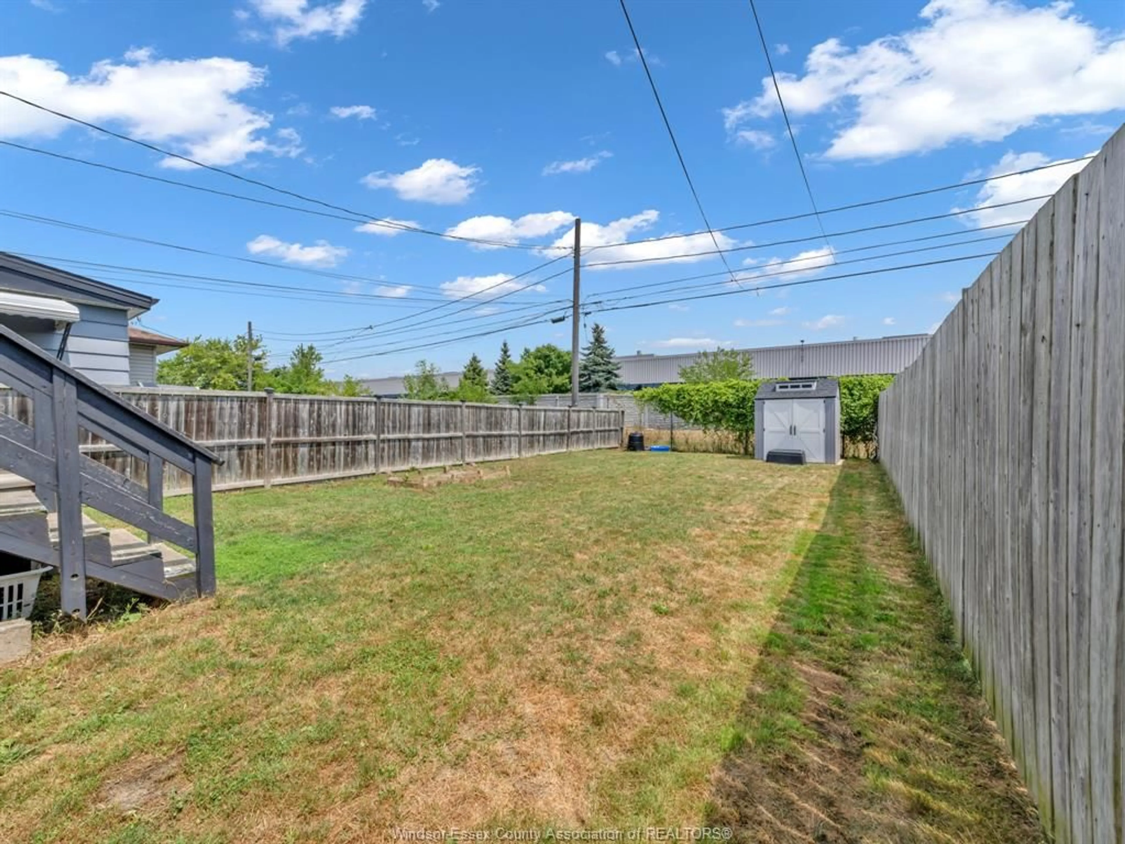 A pic from outside/outdoor area/front of a property/back of a property/a pic from drone, street for 1346 HENRY FORD CENTRE, Windsor Ontario N8Y 2T8