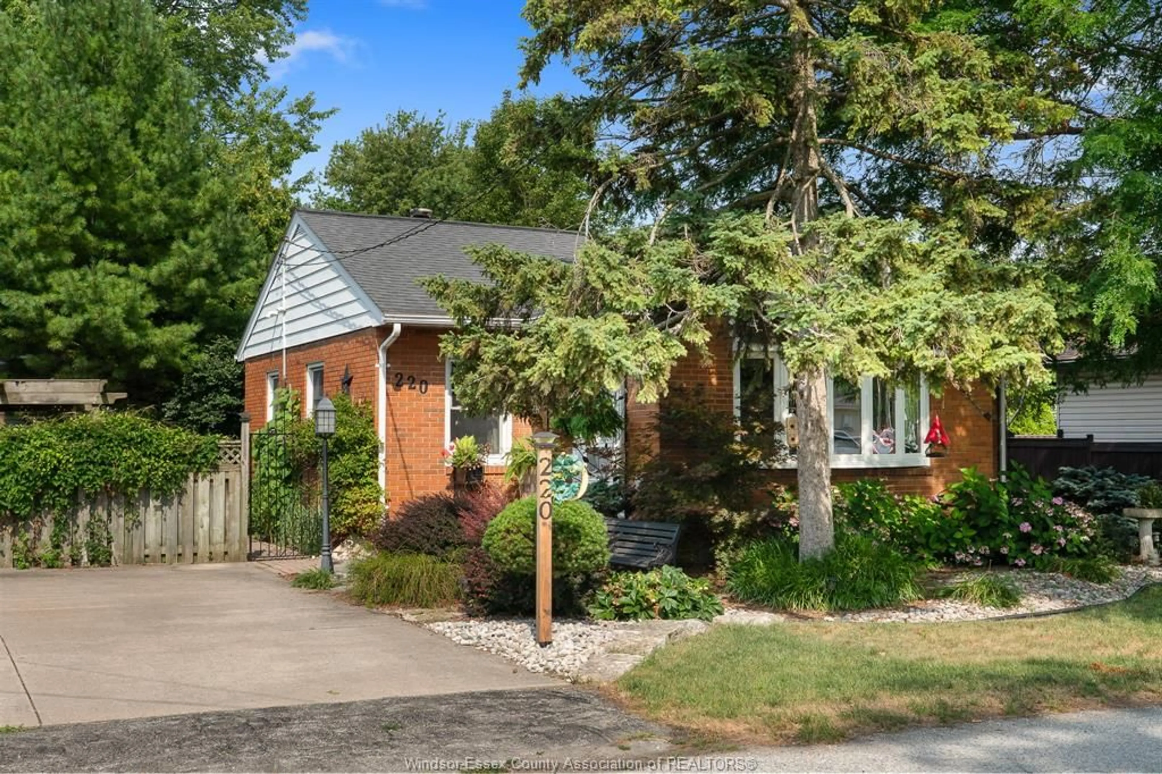 Home with brick exterior material, street for 220 SEVENTH (7TH STREET) St, Lakeshore Ontario N0R 1A0