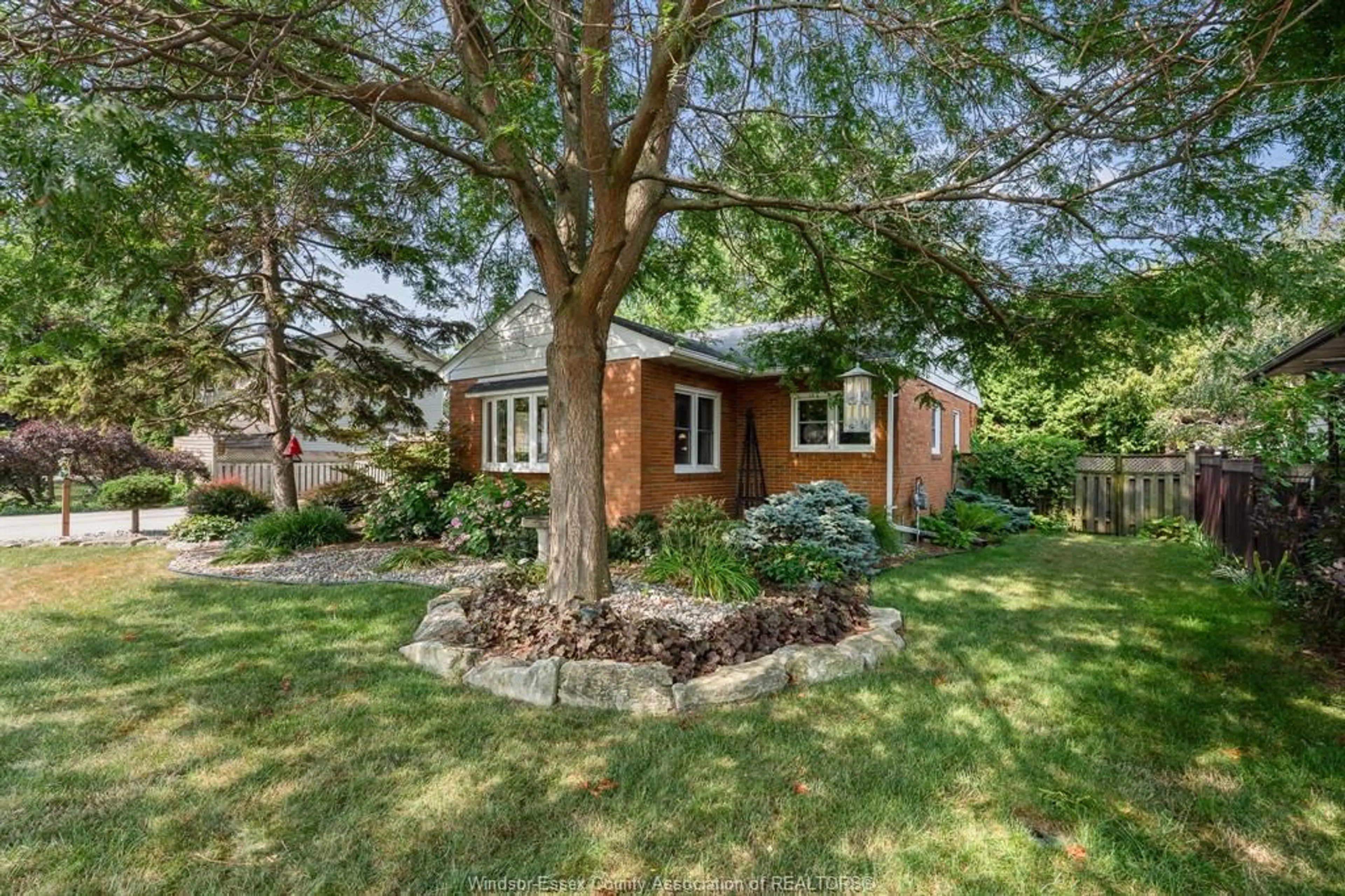 Home with brick exterior material, street for 220 SEVENTH (7TH STREET) St, Lakeshore Ontario N0R 1A0