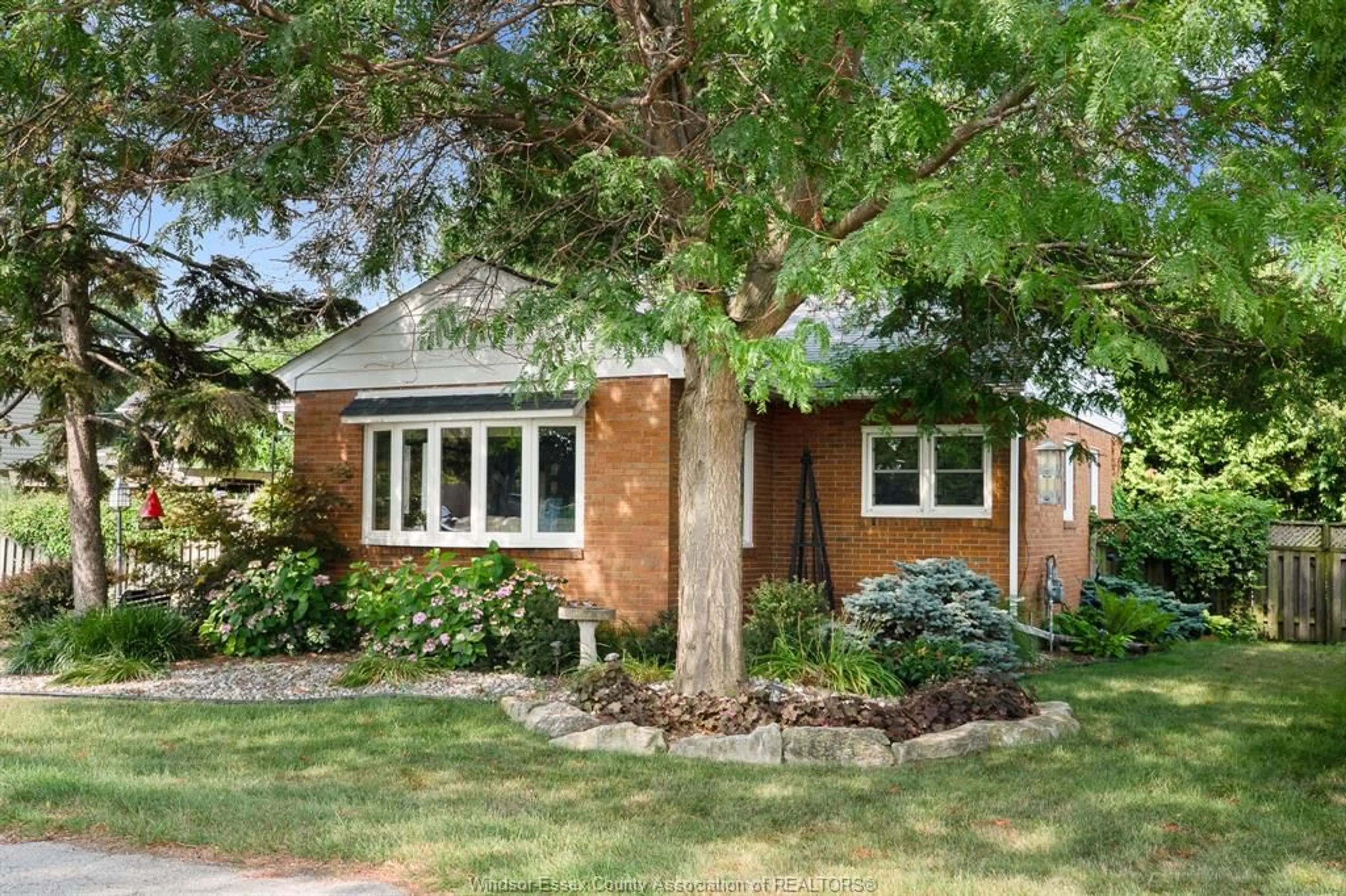 Home with brick exterior material, street for 220 SEVENTH (7TH STREET) St, Lakeshore Ontario N0R 1A0