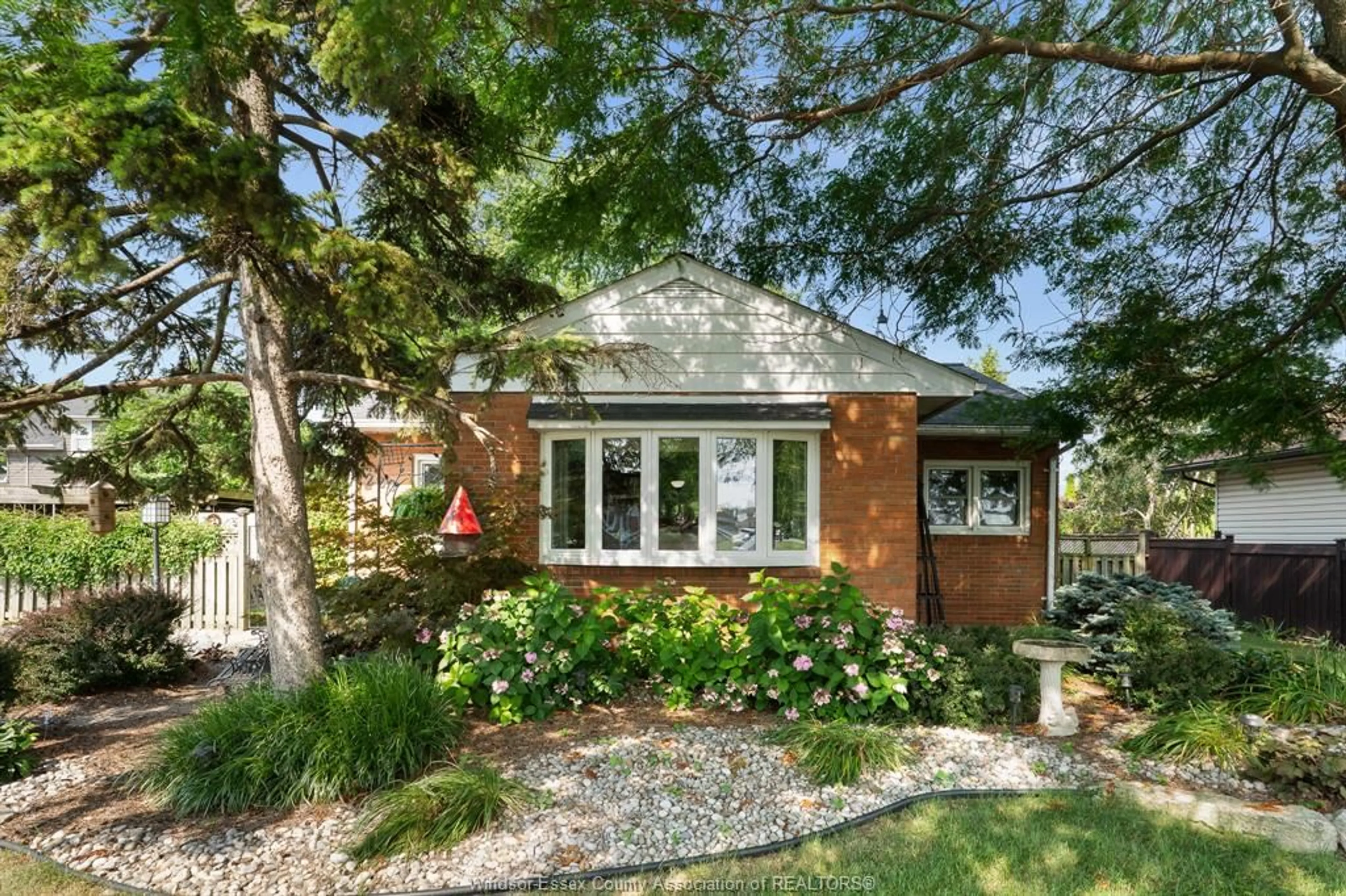 Home with brick exterior material, street for 220 SEVENTH (7TH STREET) St, Lakeshore Ontario N0R 1A0