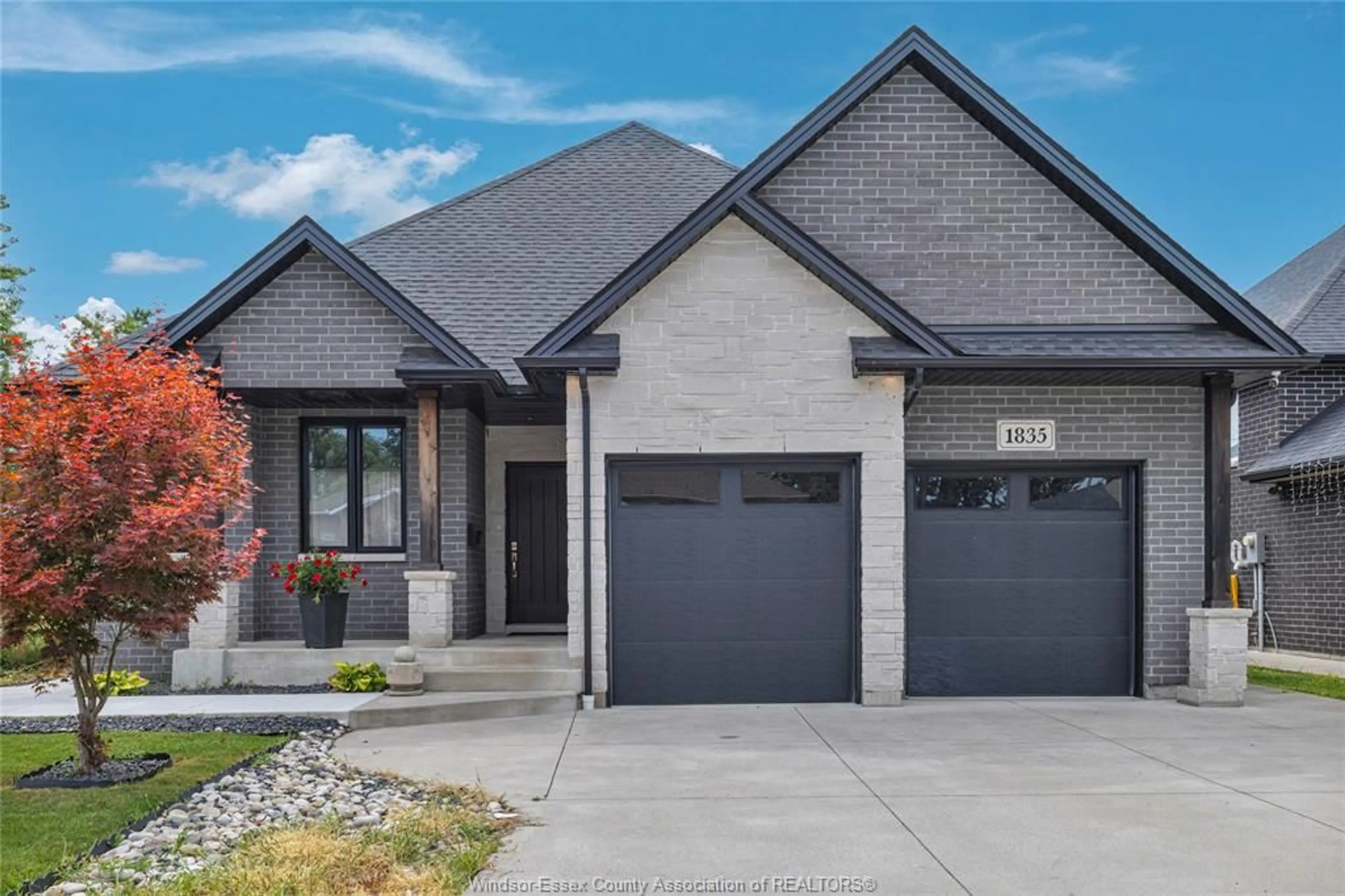 Home with brick exterior material, street for 1835 DOMINION Blvd, Windsor Ontario N9B 3H8
