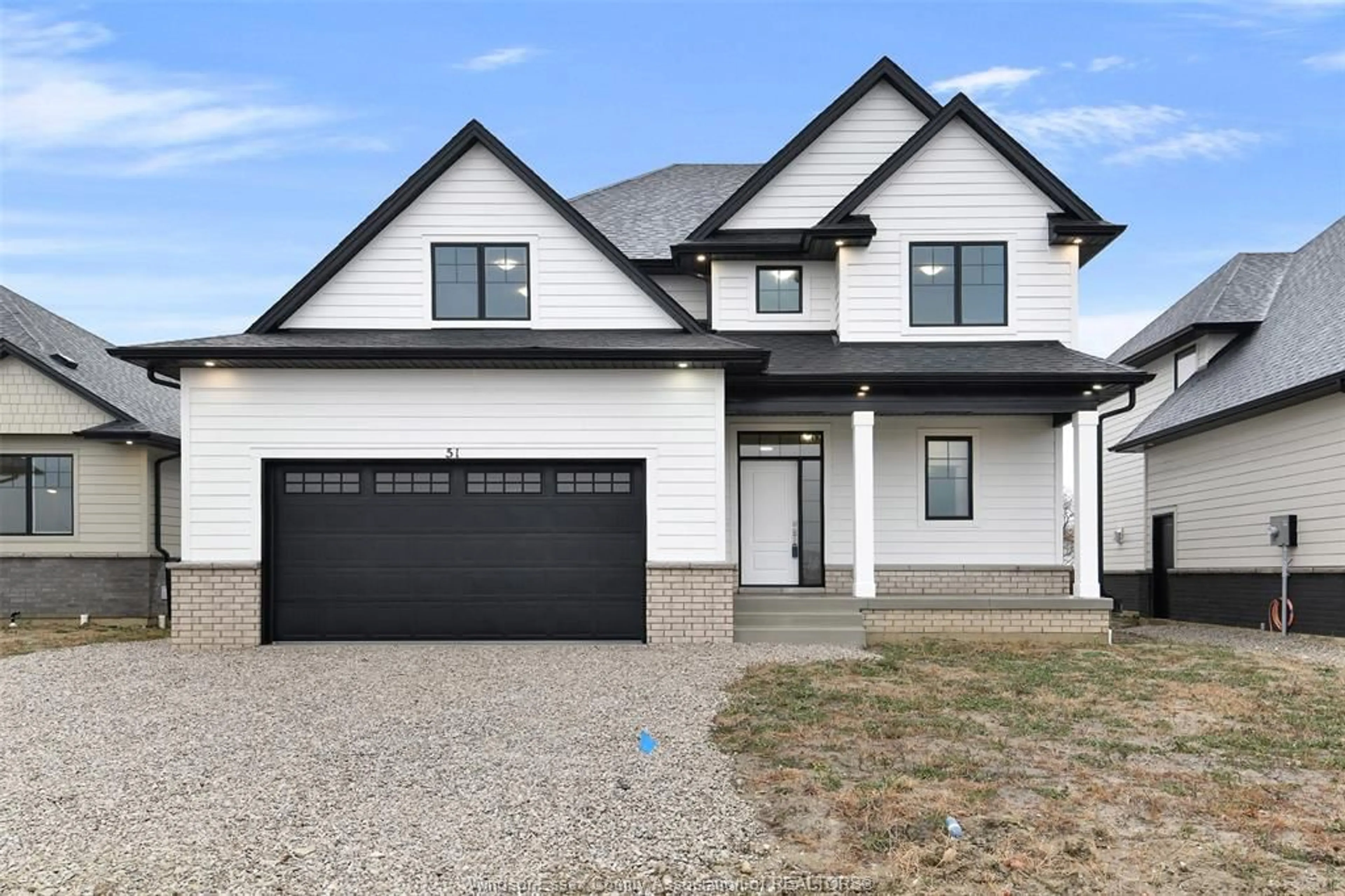 Home with brick exterior material, street for 51 BELLEVIEW Dr, Kingsville Ontario N0R 1B0