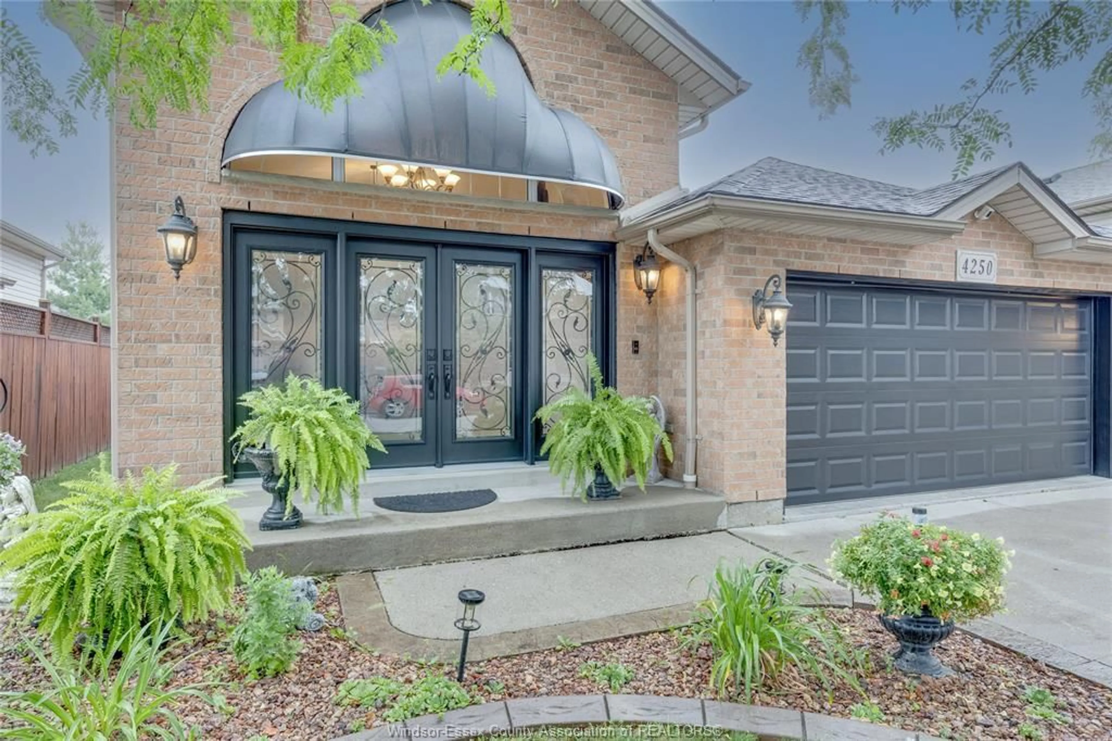 Home with brick exterior material, street for 4250 Canberra, Windsor Ontario N9G 3E8
