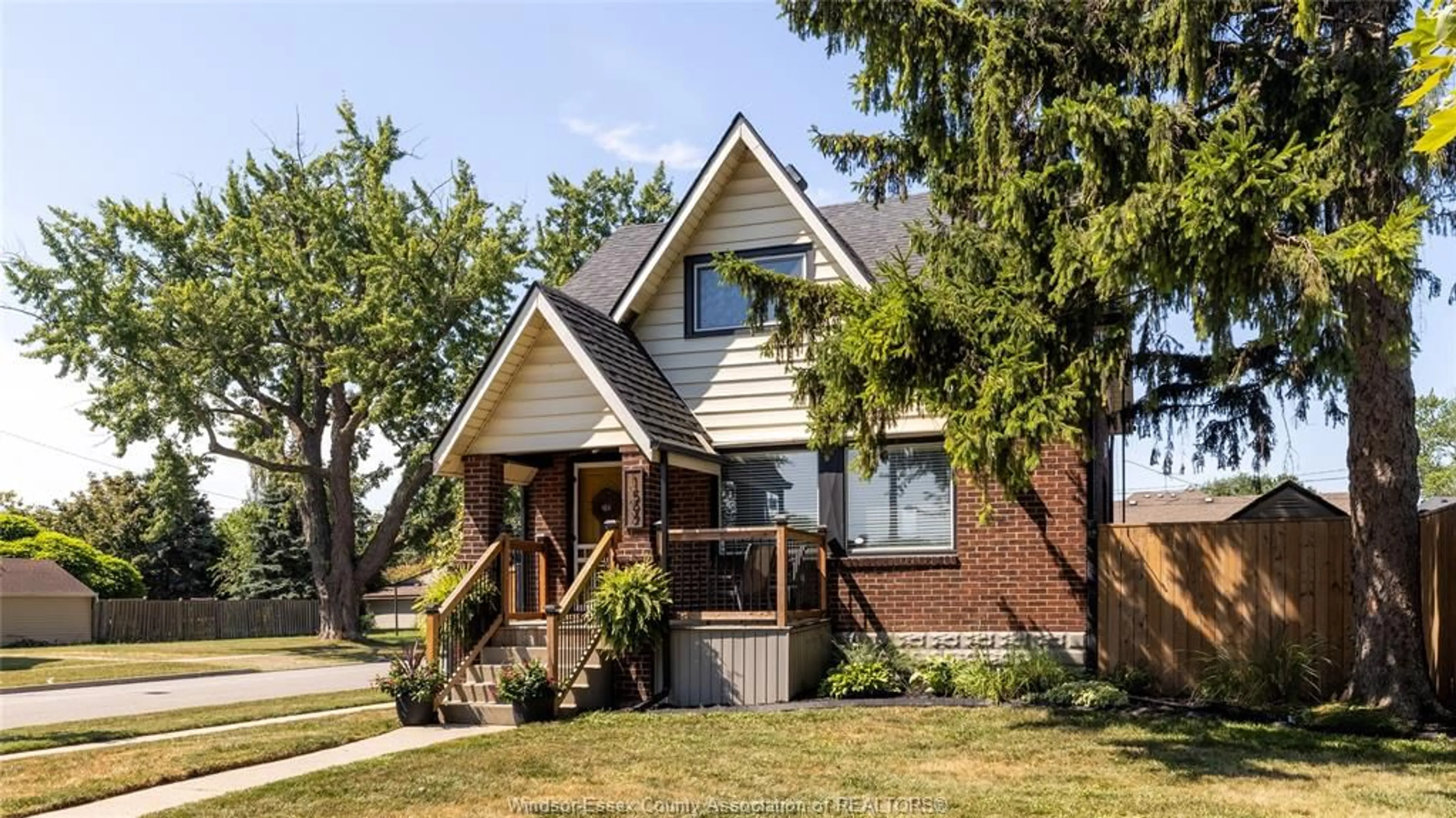 Home with brick exterior material, street for 1597 BERNARD Rd, Windsor Ontario N8Y 4K5