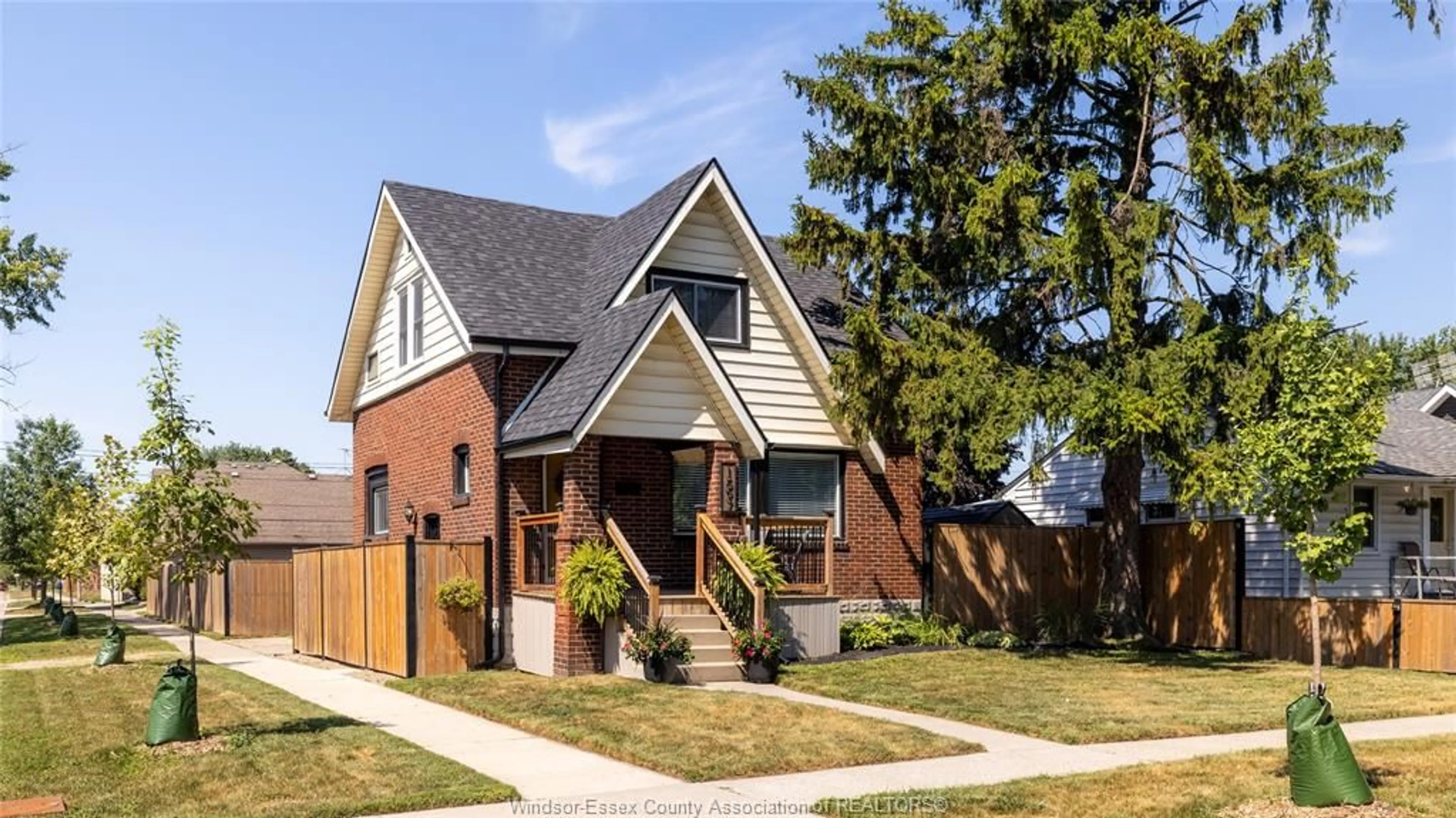 Home with brick exterior material, street for 1597 BERNARD Rd, Windsor Ontario N8Y 4K5