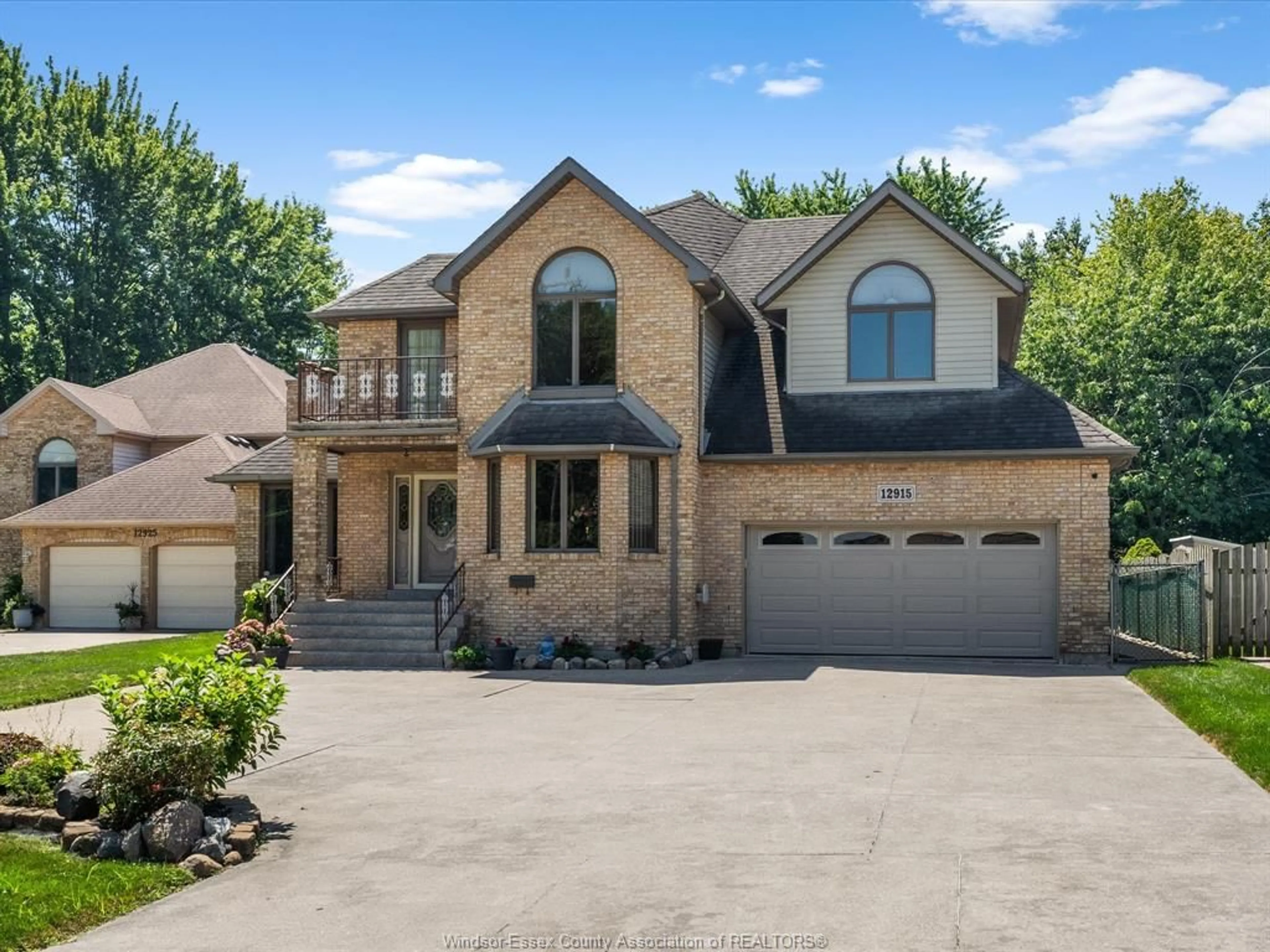 Home with brick exterior material, street for 12915 RIVERSIDE Dr, Tecumseh Ontario N8N 1A9