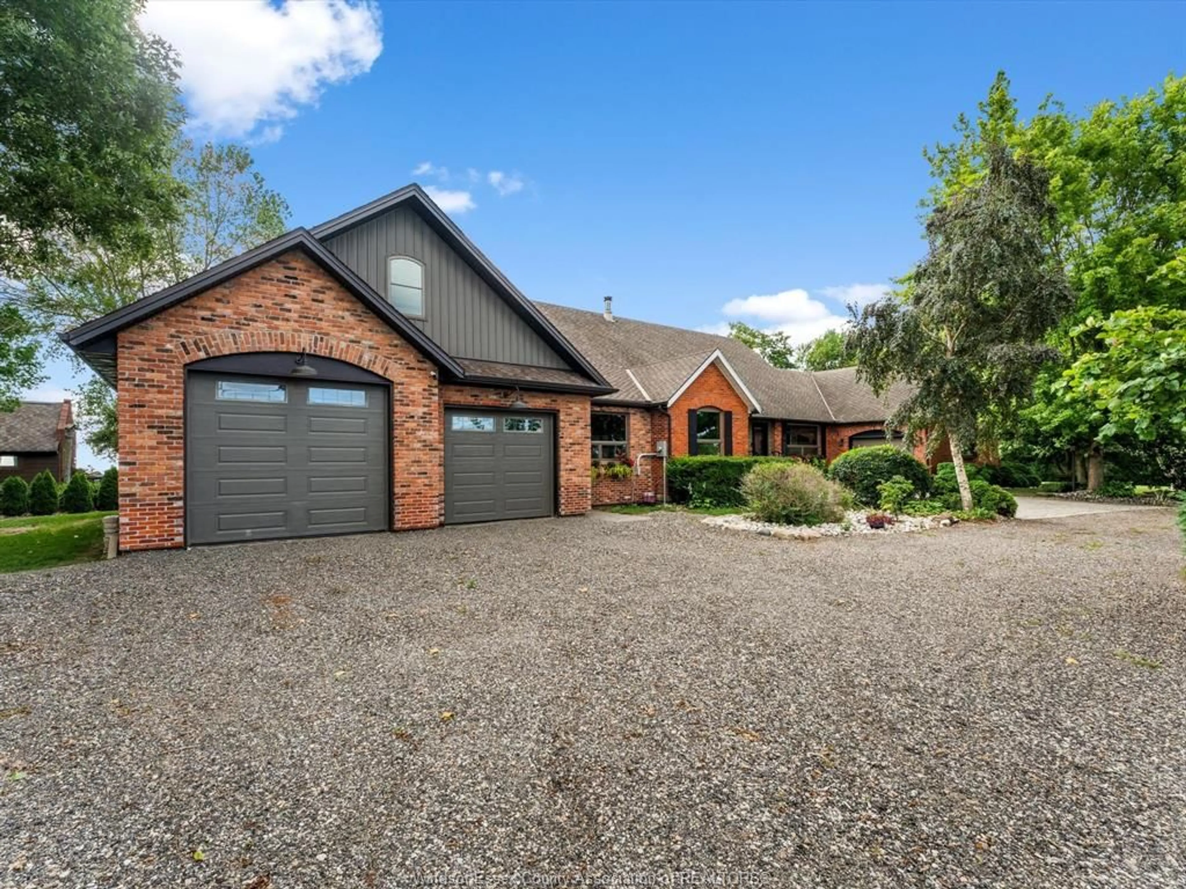 A pic from outside/outdoor area/front of a property/back of a property/a pic from drone, street for 266 EAST BEACH RD, Leamington Ontario N8H 3V7