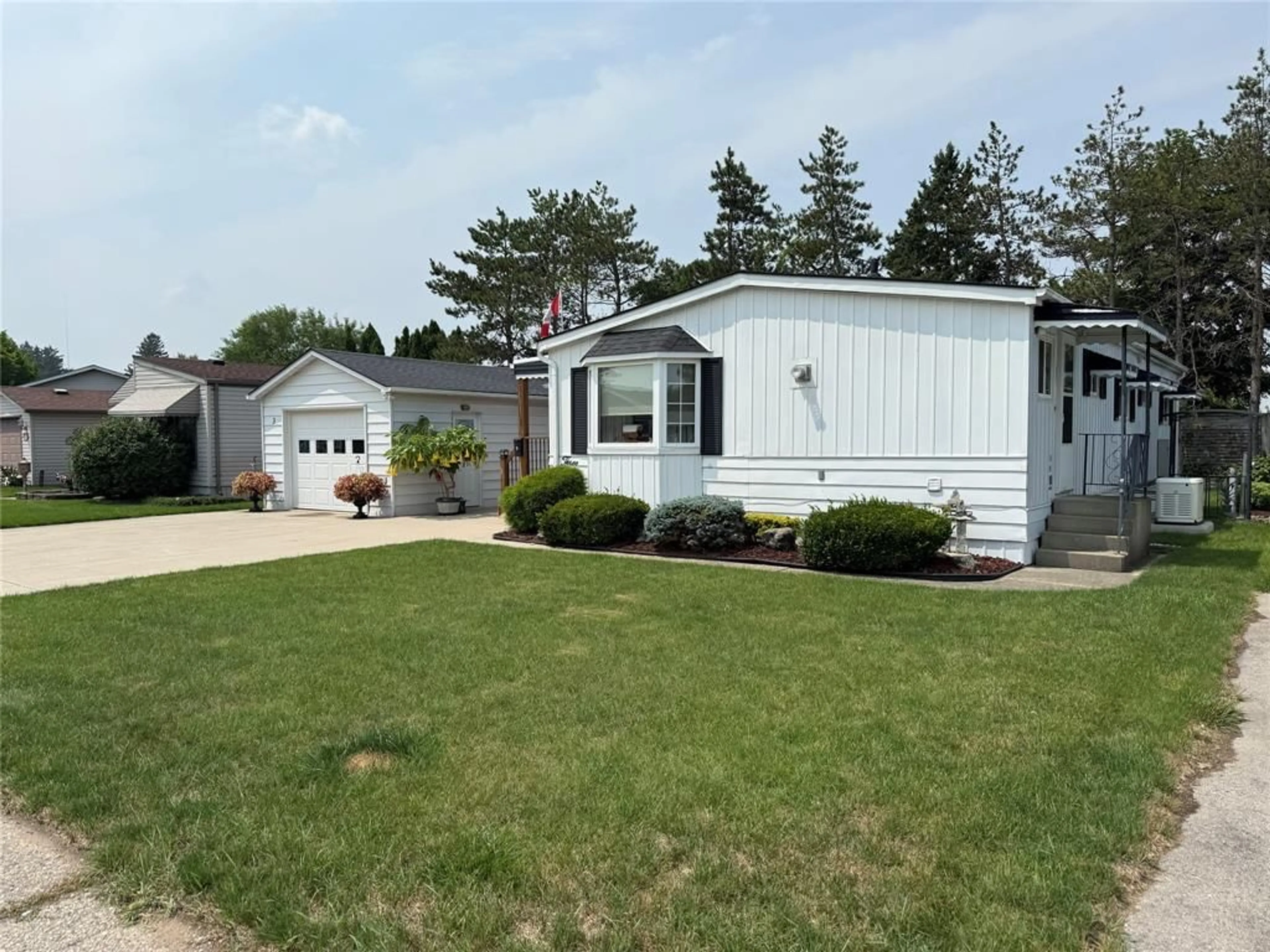 Home with vinyl exterior material, street for 3 MILLER St, Strathroy Ontario N7G 1A5