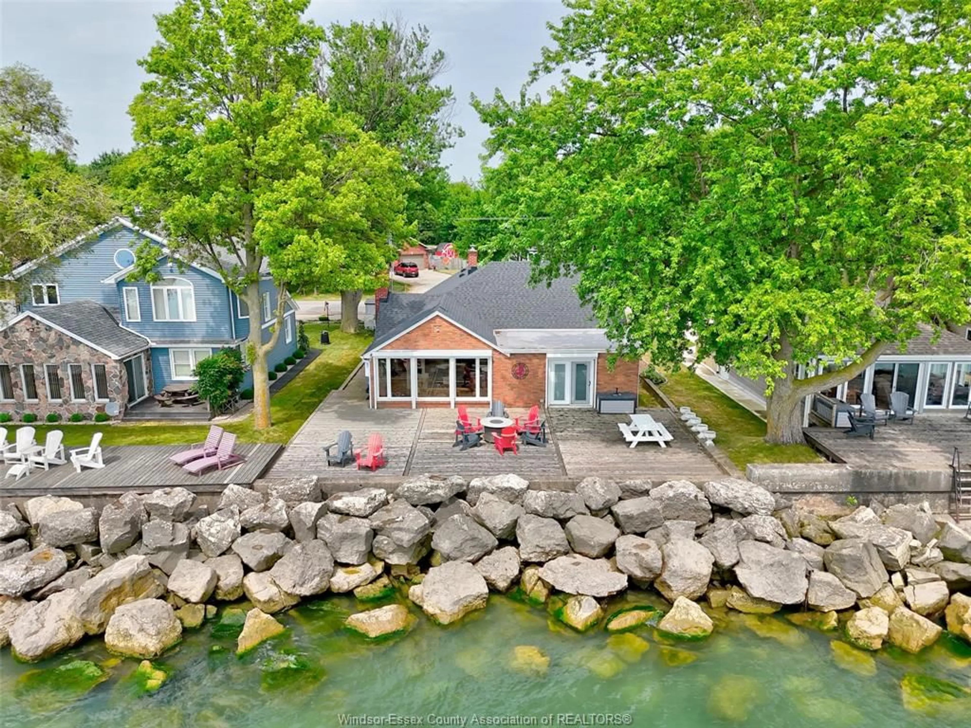 A pic from outside/outdoor area/front of a property/back of a property/a pic from drone, water/lake/river/ocean view for 704 POINT PELEE Dr, Leamington Ontario N8H 3V4
