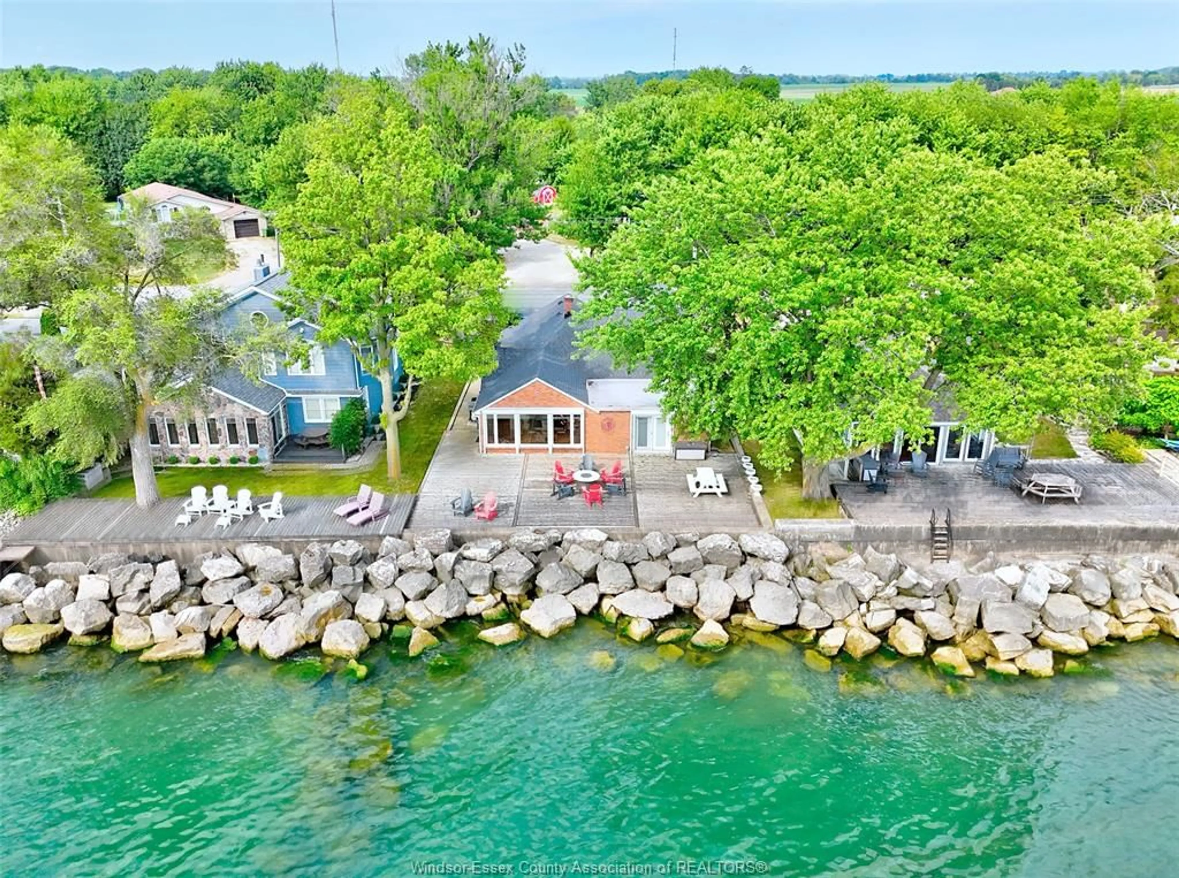 A pic from outside/outdoor area/front of a property/back of a property/a pic from drone, water/lake/river/ocean view for 704 POINT PELEE Dr, Leamington Ontario N8H 3V4