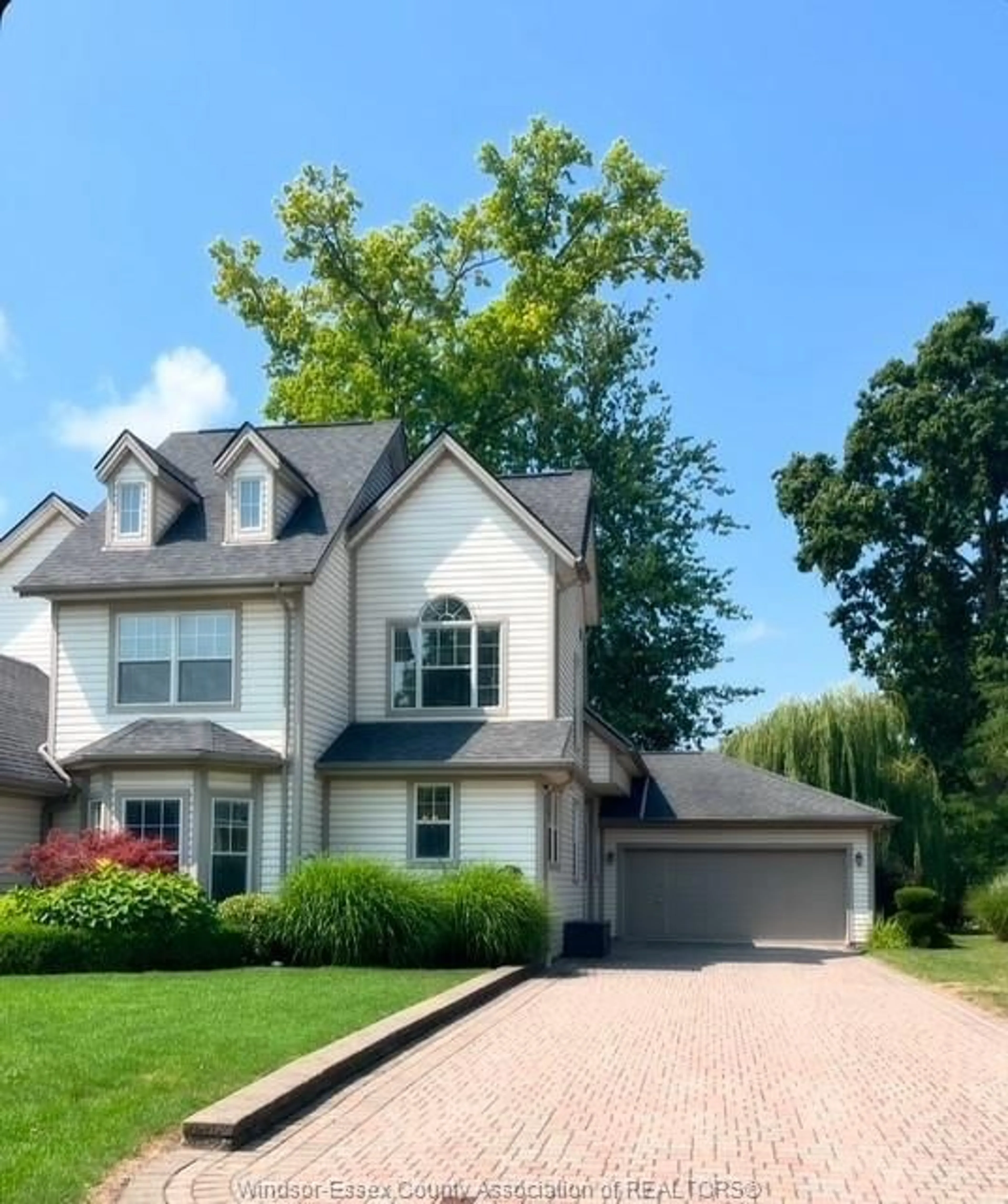 Home with brick exterior material, street for 71 RED OAK Cres, Amherstburg Ontario N9V 4C4