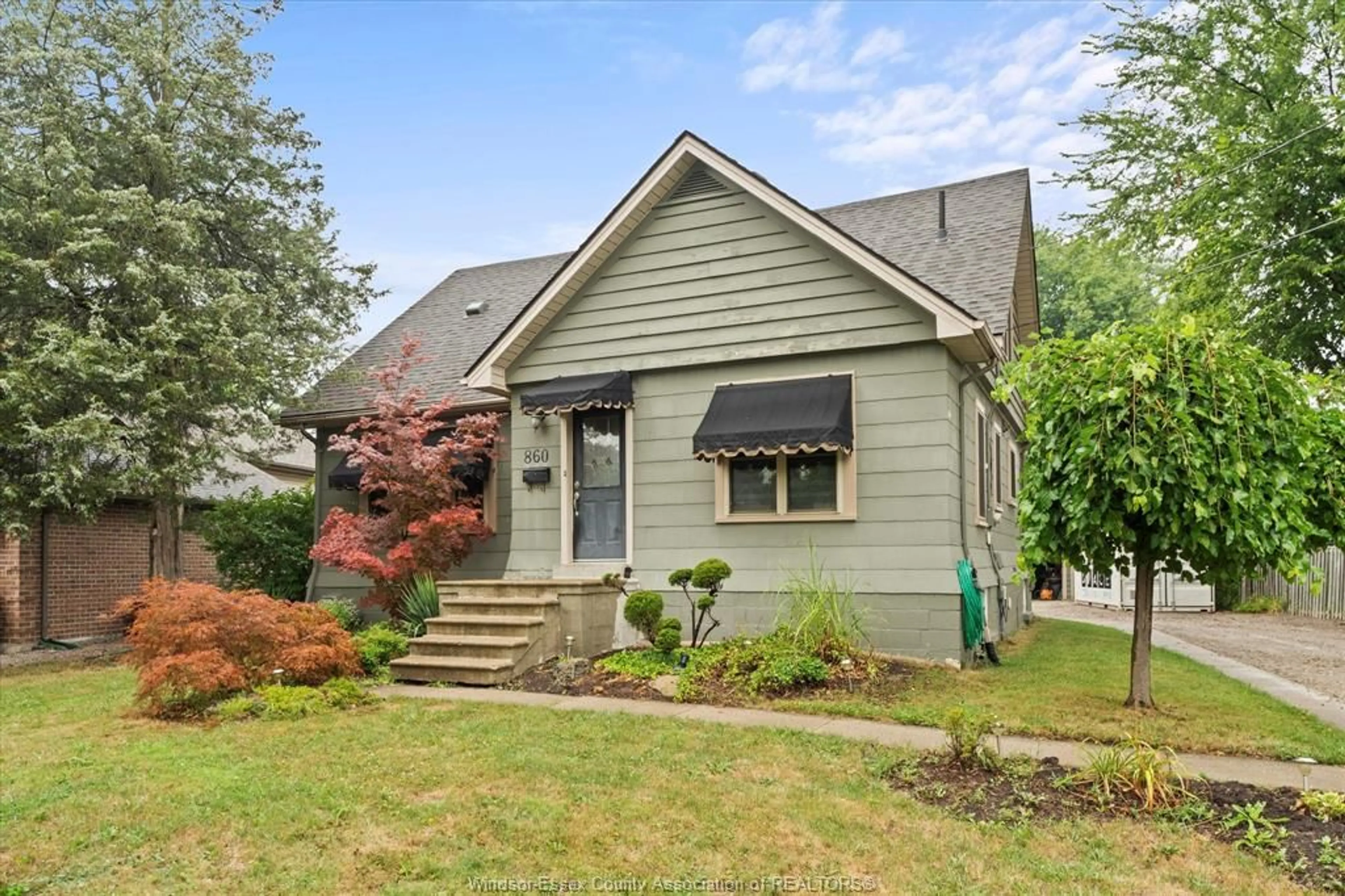 Home with vinyl exterior material, street for 860 NORTH TALBOT Rd, Windsor Ontario N9G 1M7