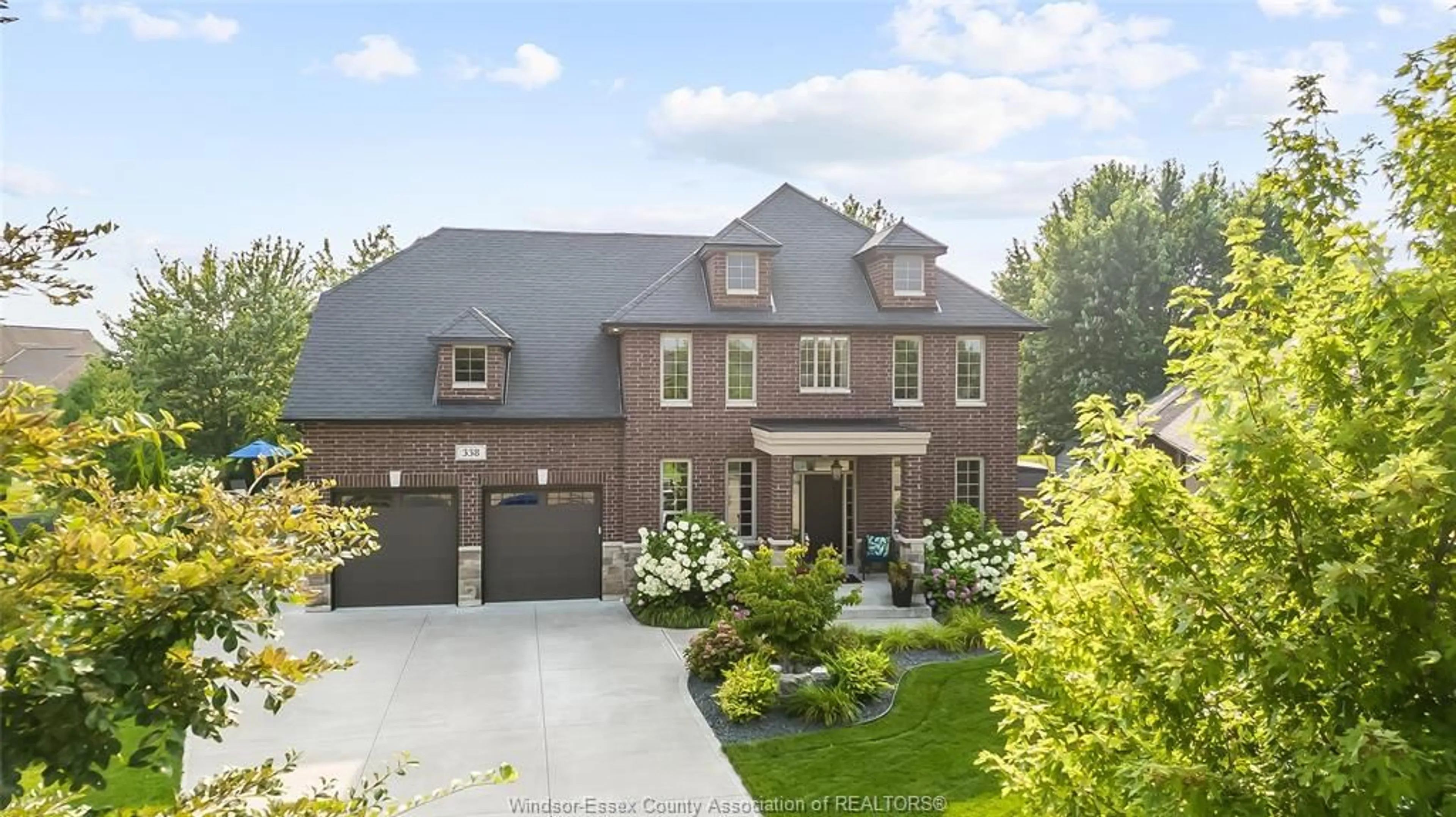 Home with brick exterior material, street for 338 LAKEWOOD Cres, Tecumseh Ontario N8N 0E1