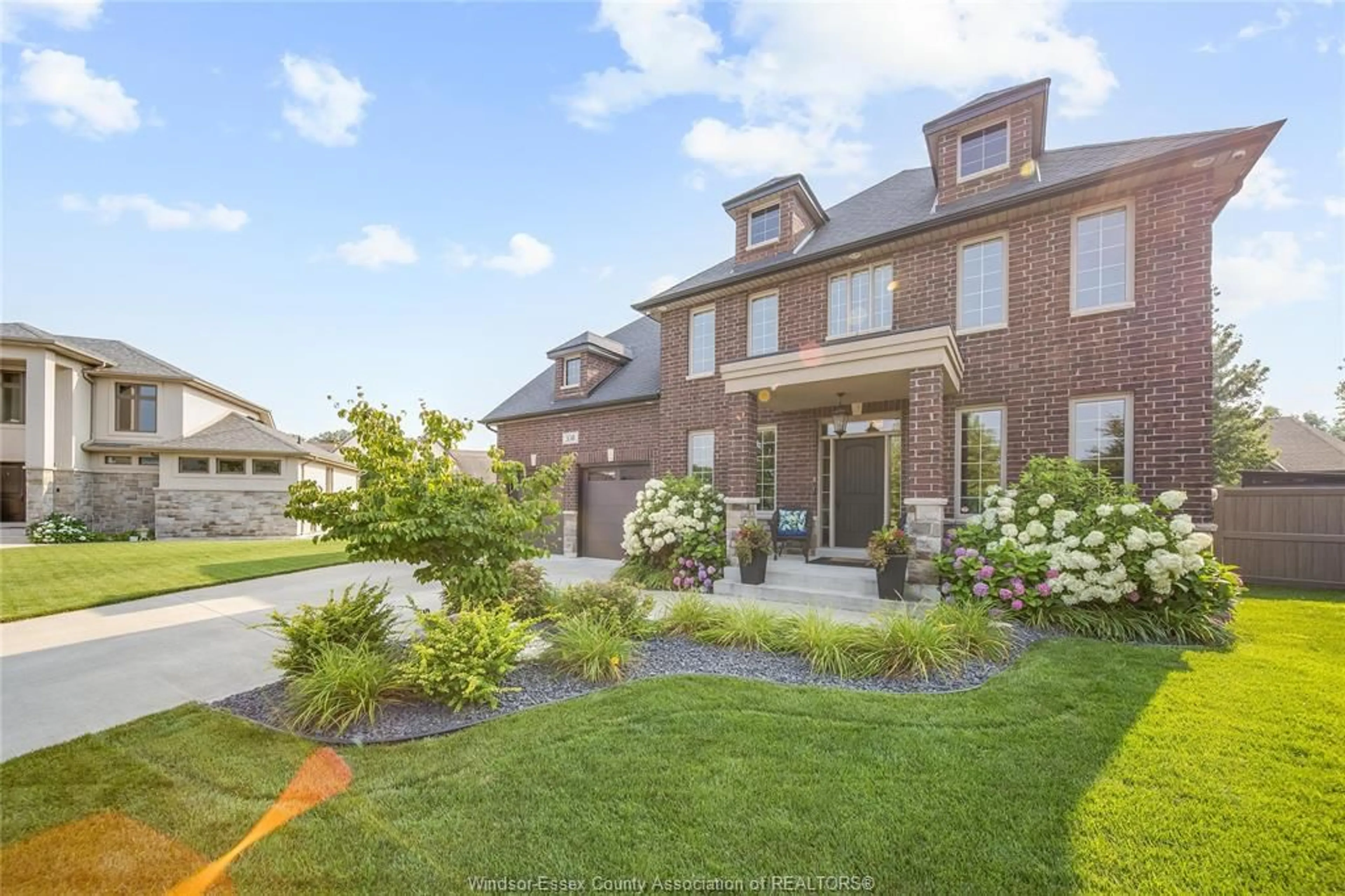 Home with brick exterior material, street for 338 LAKEWOOD Cres, Tecumseh Ontario N8N 0E1