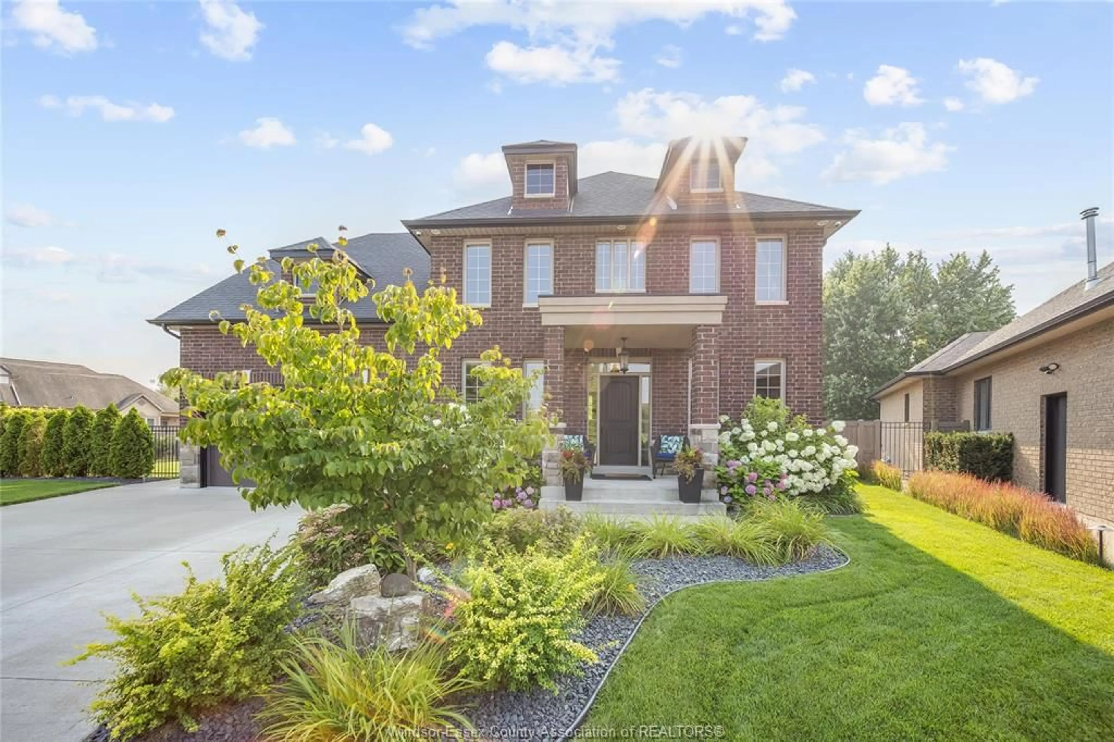 Home with brick exterior material, street for 338 LAKEWOOD Cres, Tecumseh Ontario N8N 0E1