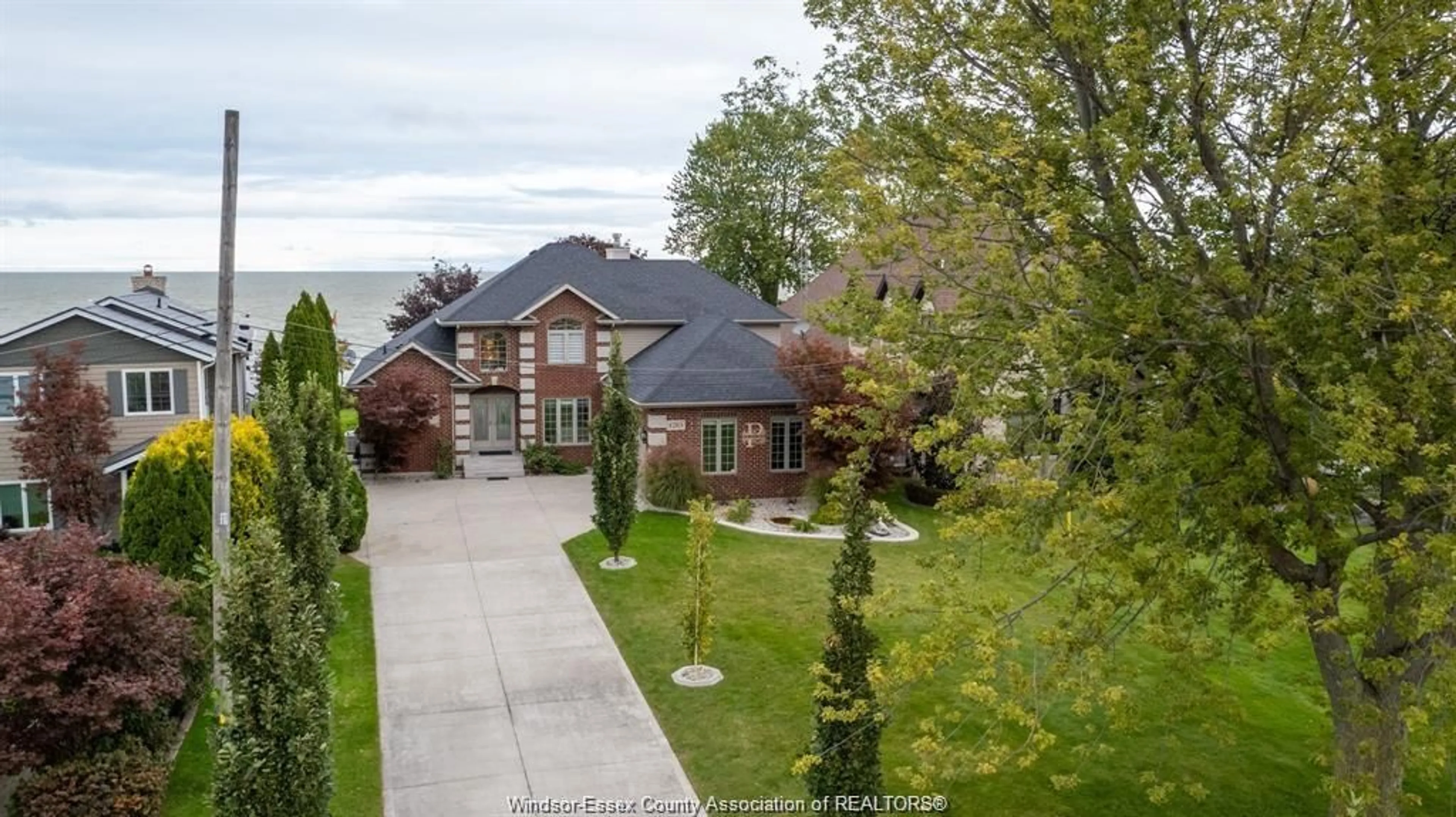 A pic from outside/outdoor area/front of a property/back of a property/a pic from drone, street for 1283 LANGE Ave, Lakeshore Ontario N0R 1S0