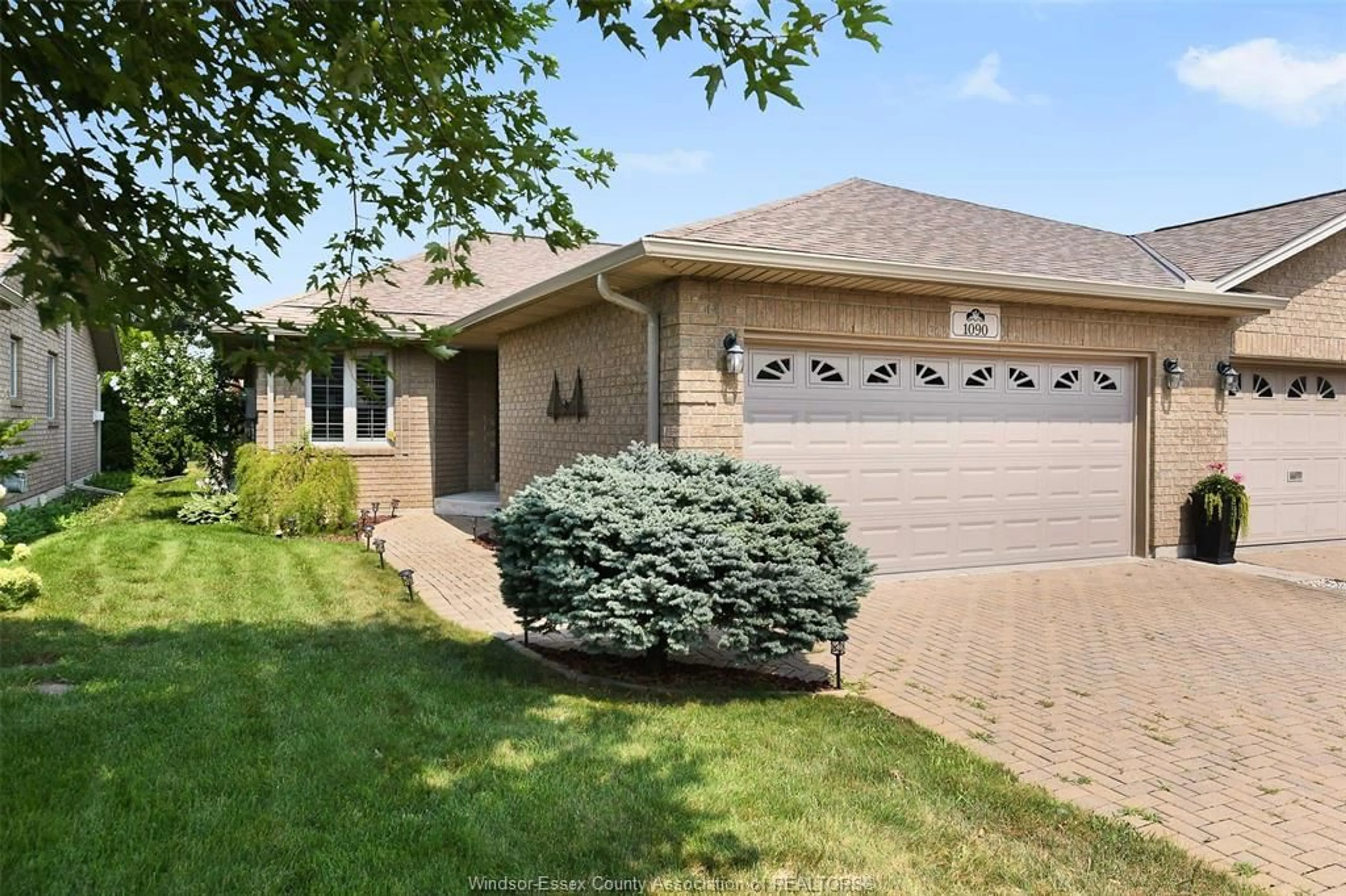 Home with brick exterior material, street for 1090 Thurso Way, Windsor Ontario N9G 2T6