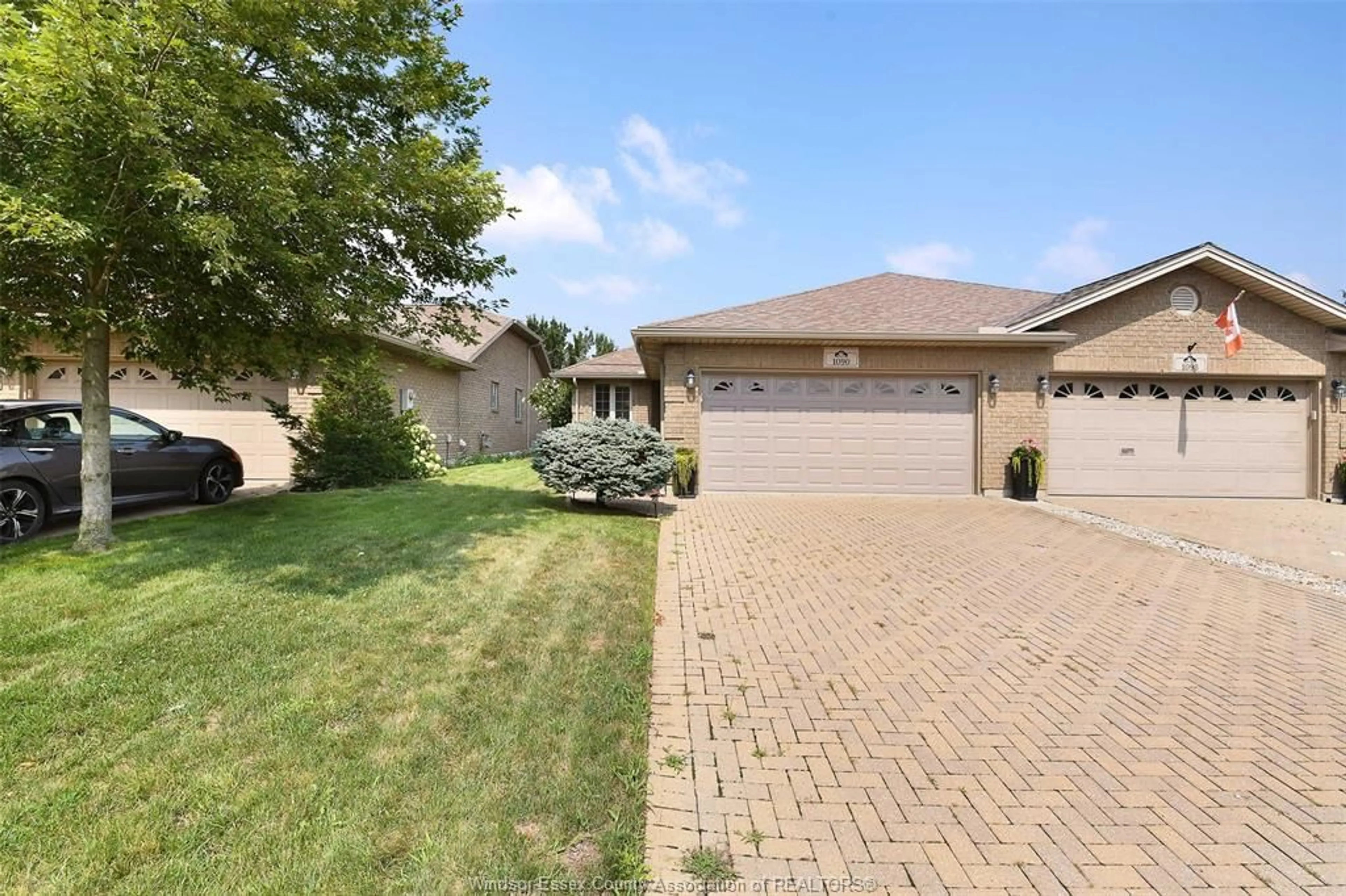A pic from outside/outdoor area/front of a property/back of a property/a pic from drone, street for 1090 Thurso Way, Windsor Ontario N9G 2T6