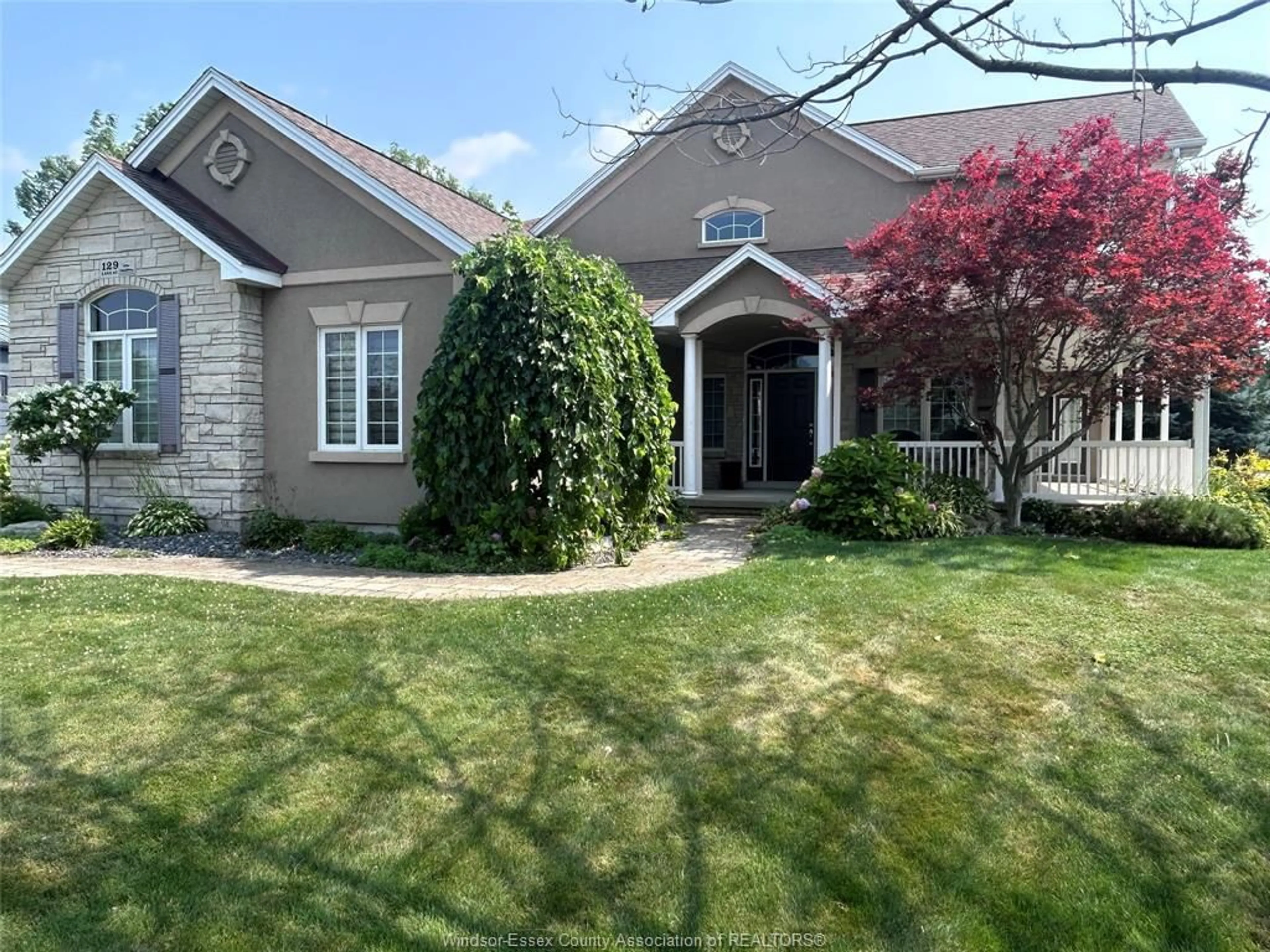 Home with vinyl exterior material, street for 129 Lake St, Mitchell's Bay Ontario N0P 1L0