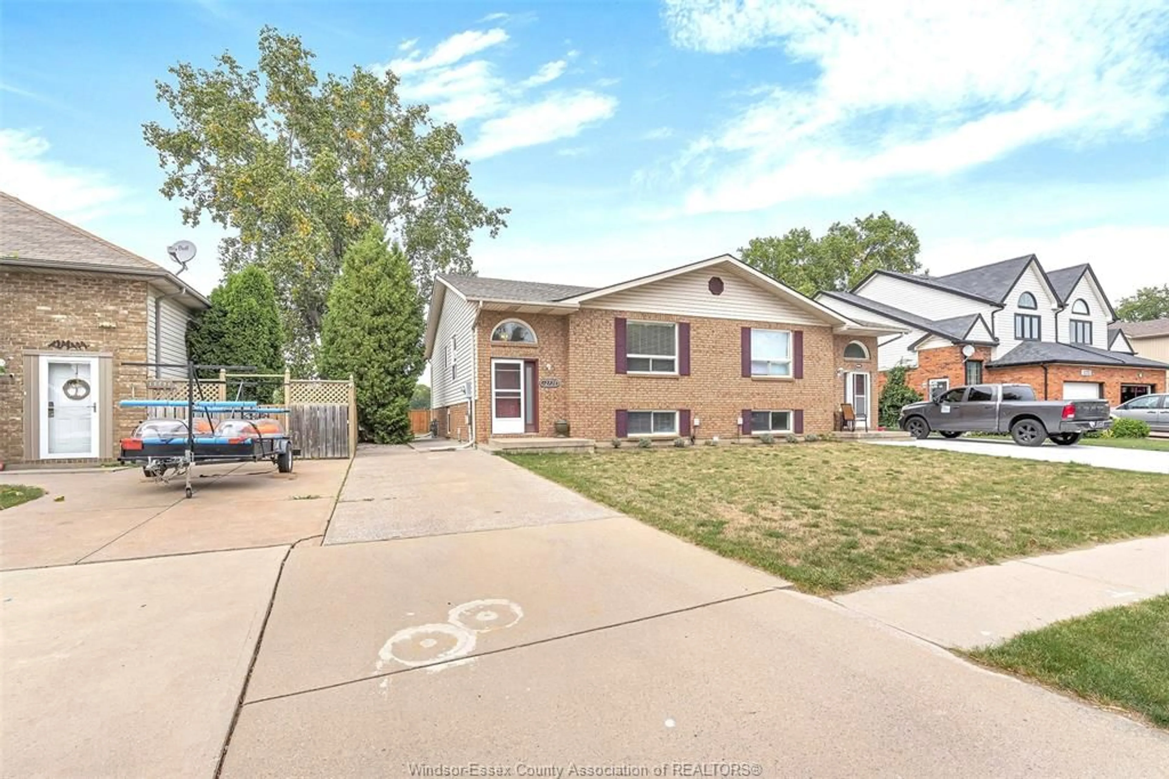 Home with brick exterior material, street for 12730 Horwood Cres, Tecumseh Ontario N8N 4T9