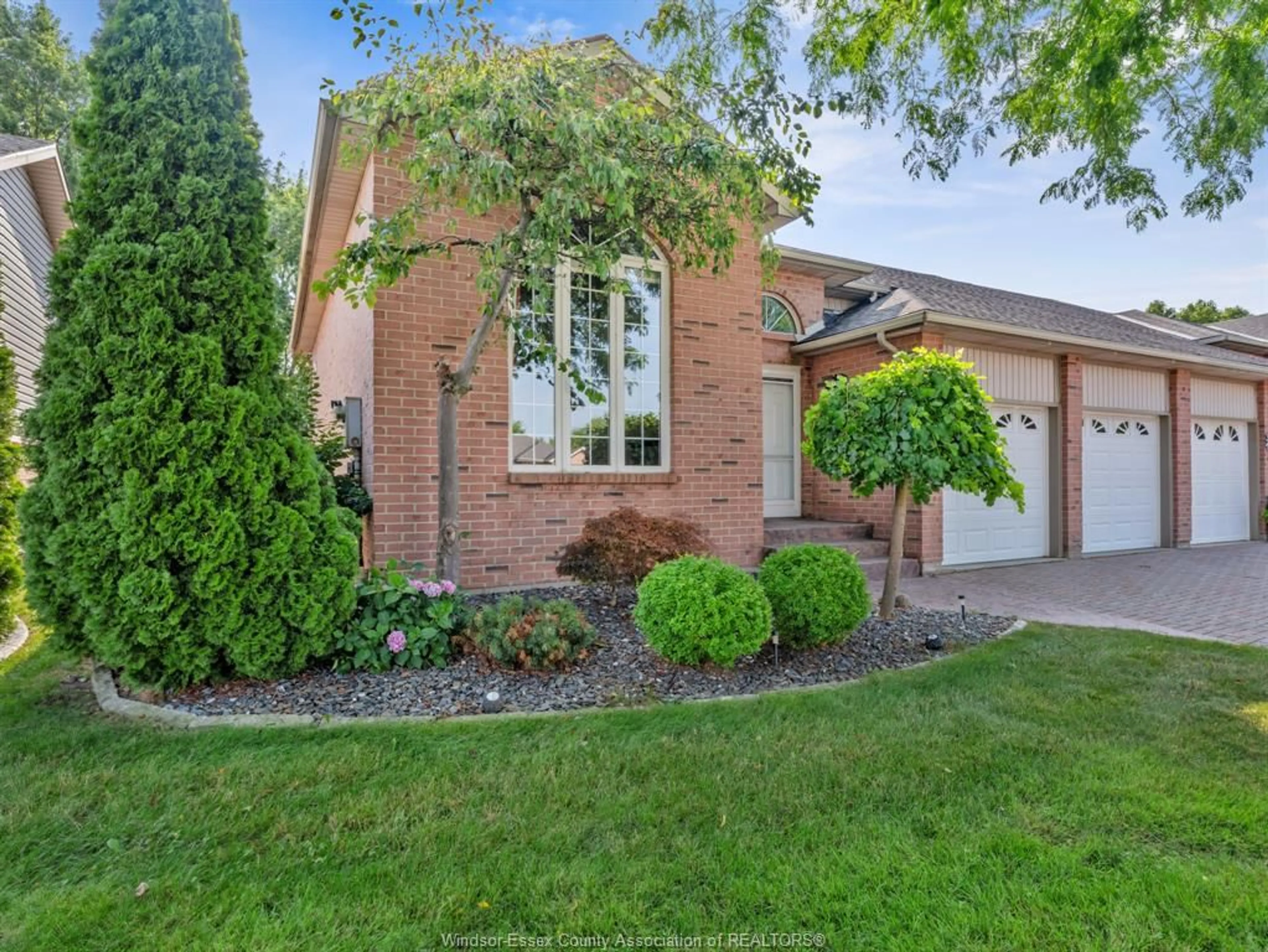 Home with brick exterior material, street for 1046 Rendezvous Dr, Windsor Ontario N8P 1K6