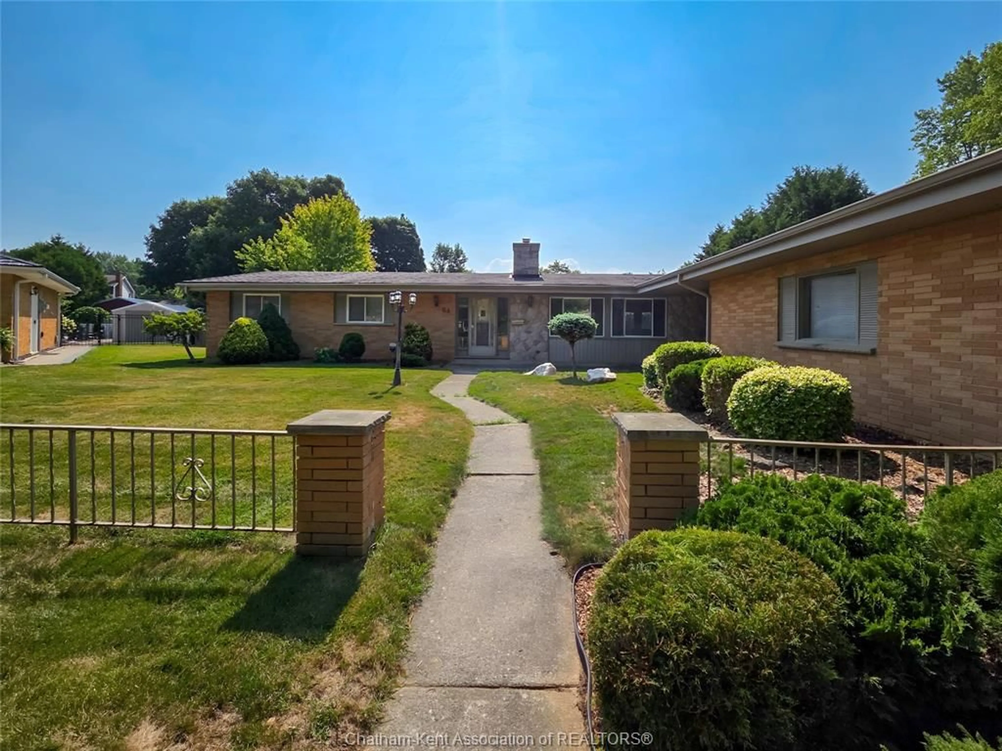 Home with brick exterior material, street for 64 Parkwood Dr, Chatham Ontario N7M 2B2