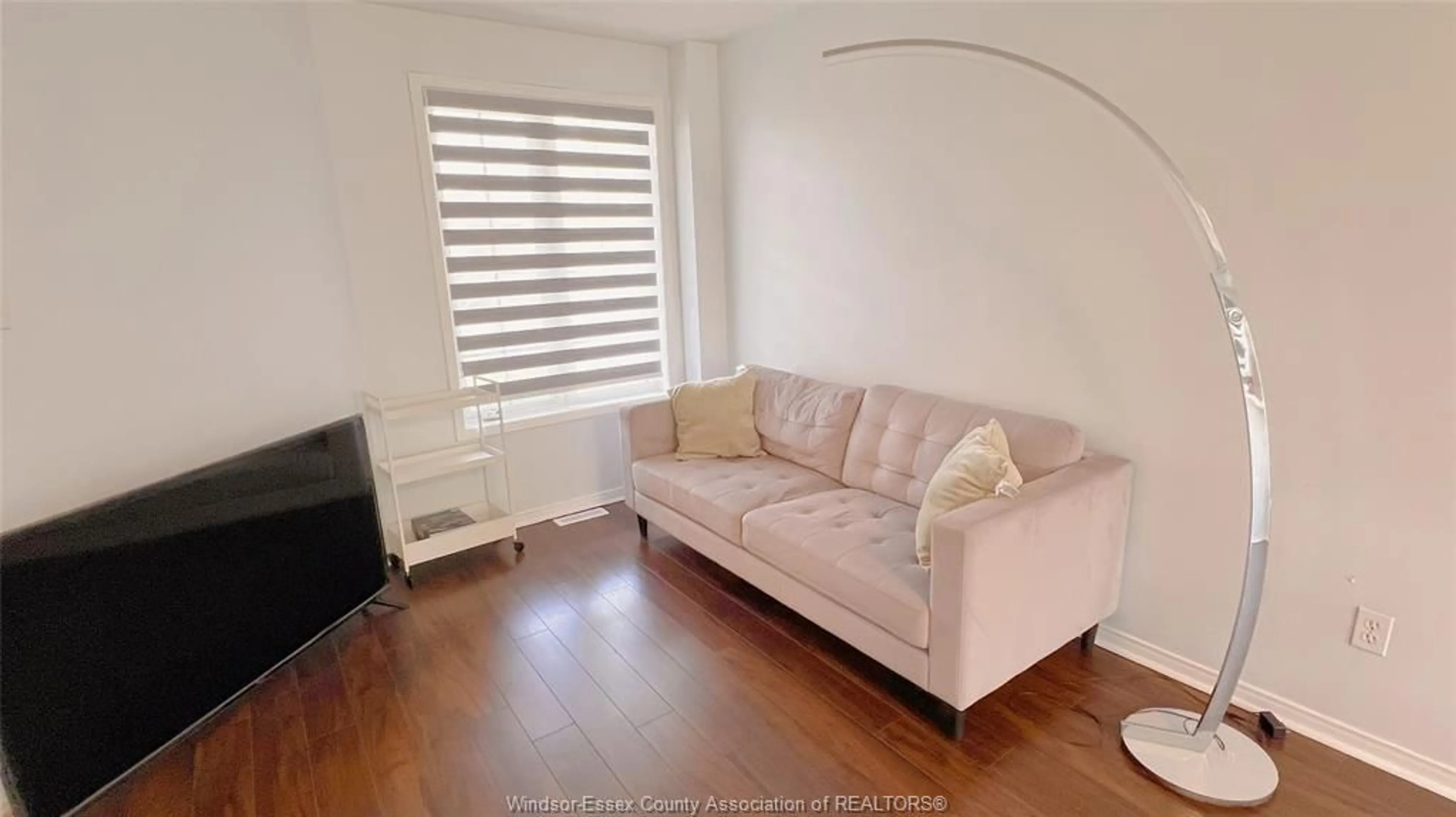 Living room with furniture, wood/laminate floor for 1010 SILVERDALE, Windsor Ontario N9G 2R8