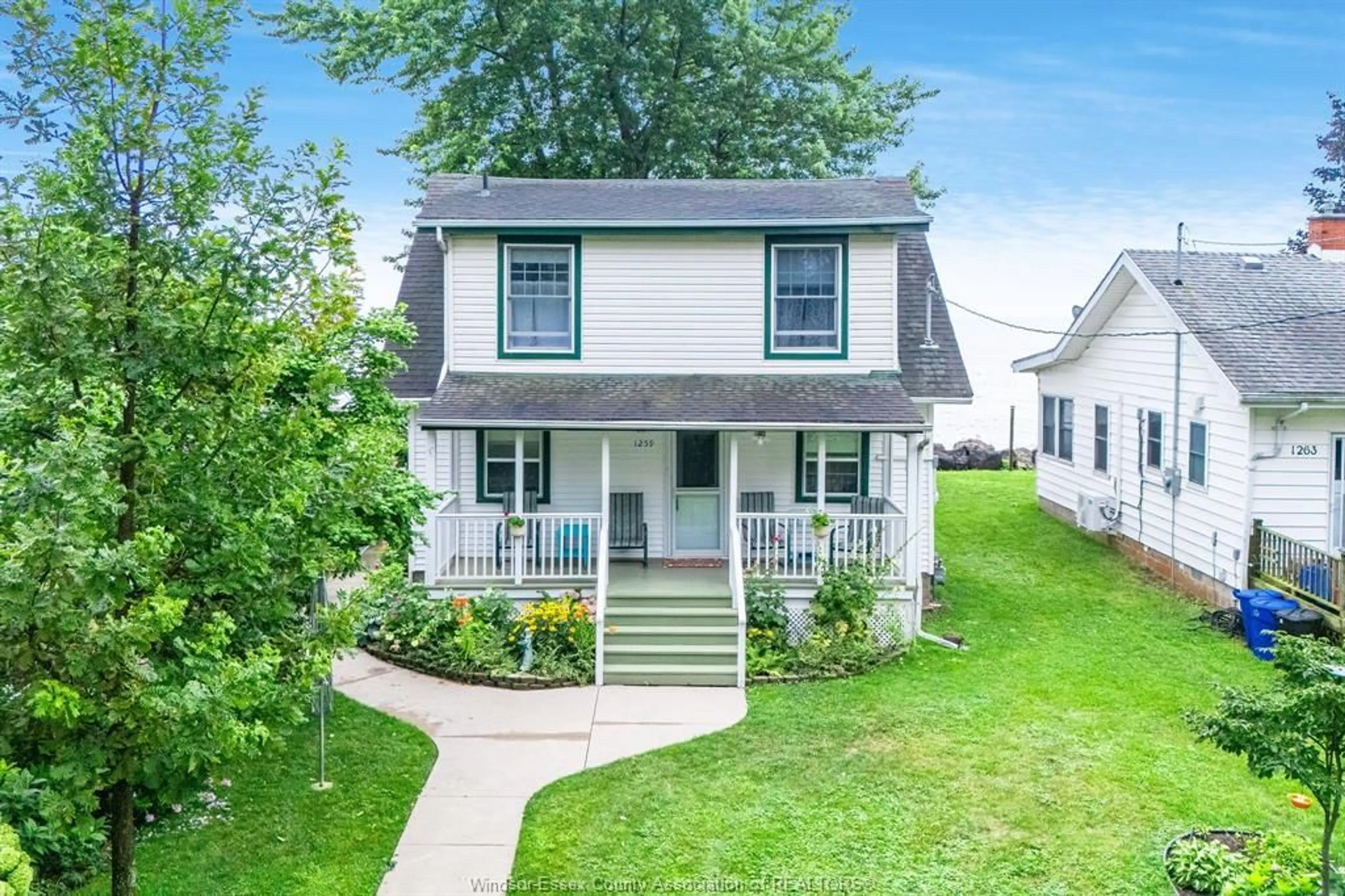 Home with vinyl exterior material, street for 1259 Heritage Rd, Kingsville Ontario N9Y 2E6