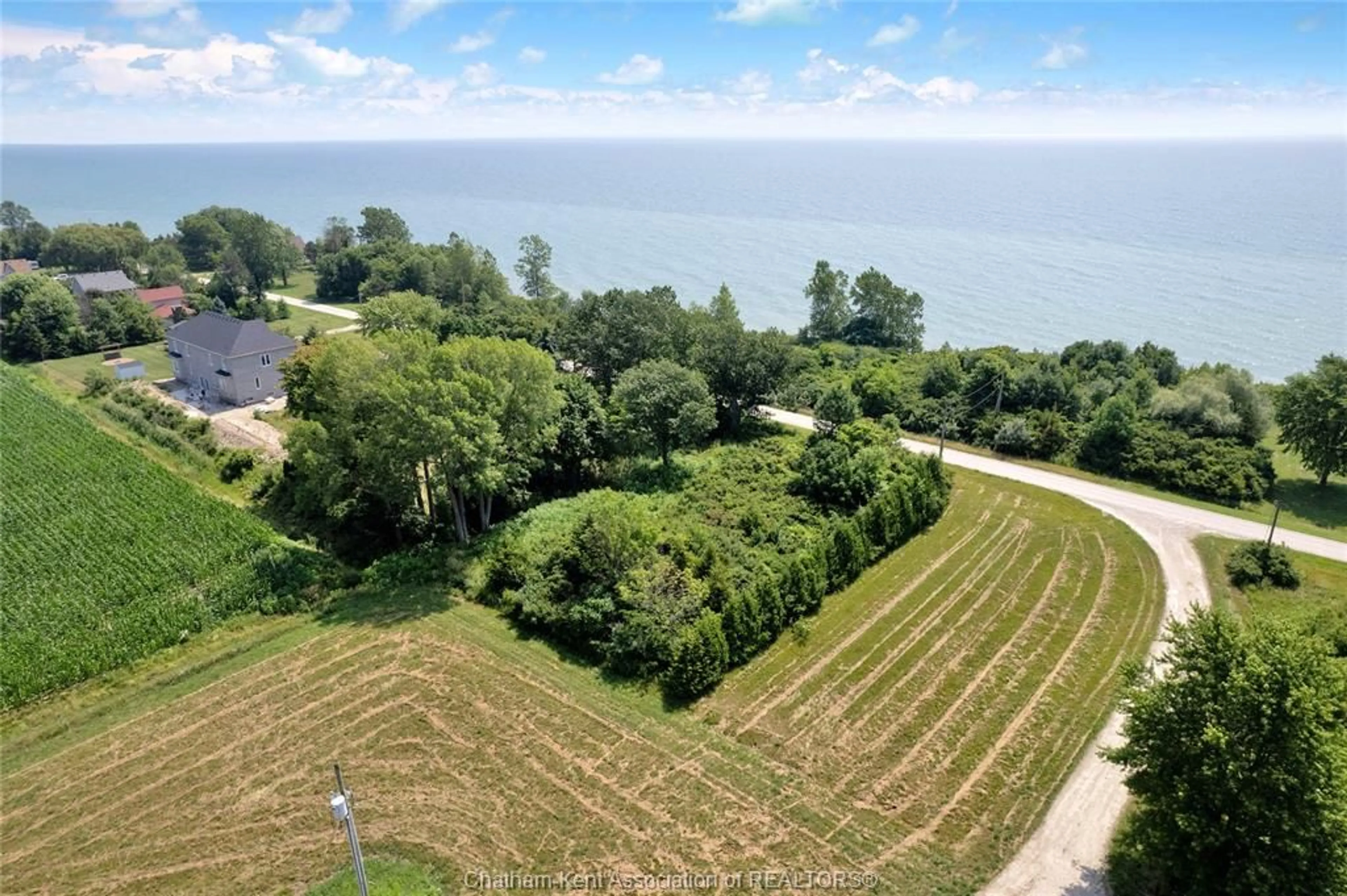 A pic from outside/outdoor area/front of a property/back of a property/a pic from drone, water/lake/river/ocean view for 1281 BLUFF Line, Wheatley Ontario N0P 2P0