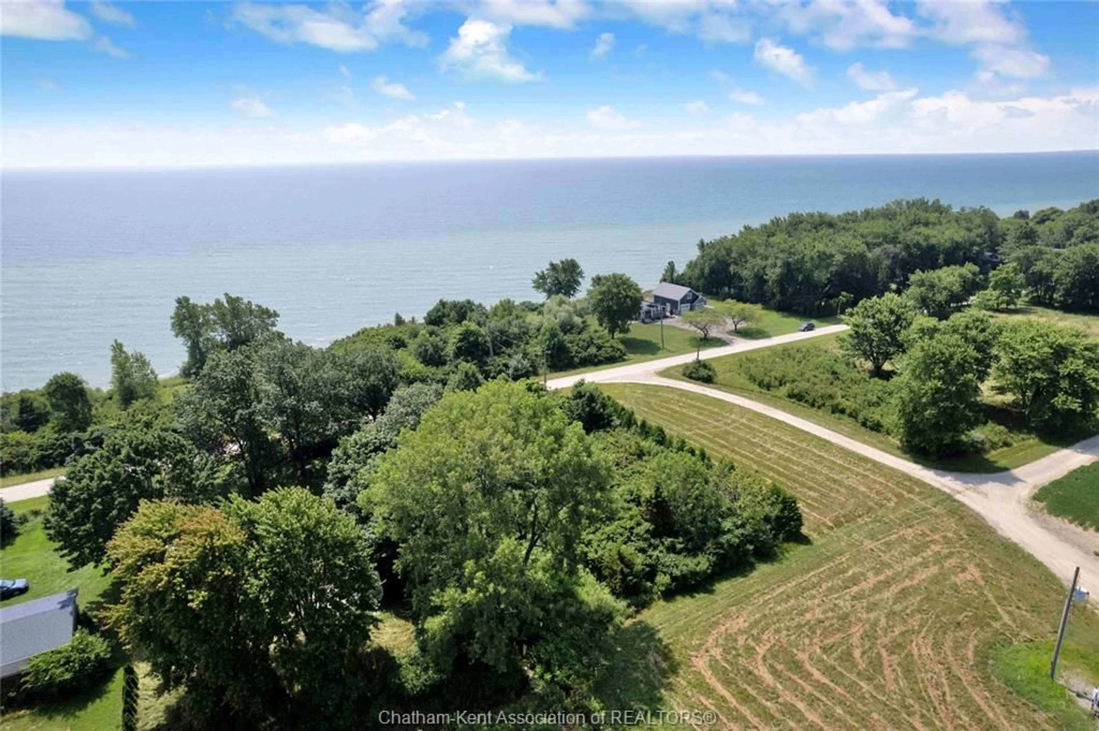 A pic from outside/outdoor area/front of a property/back of a property/a pic from drone, water/lake/river/ocean view for 1281 BLUFF Line, Wheatley Ontario N0P 2P0