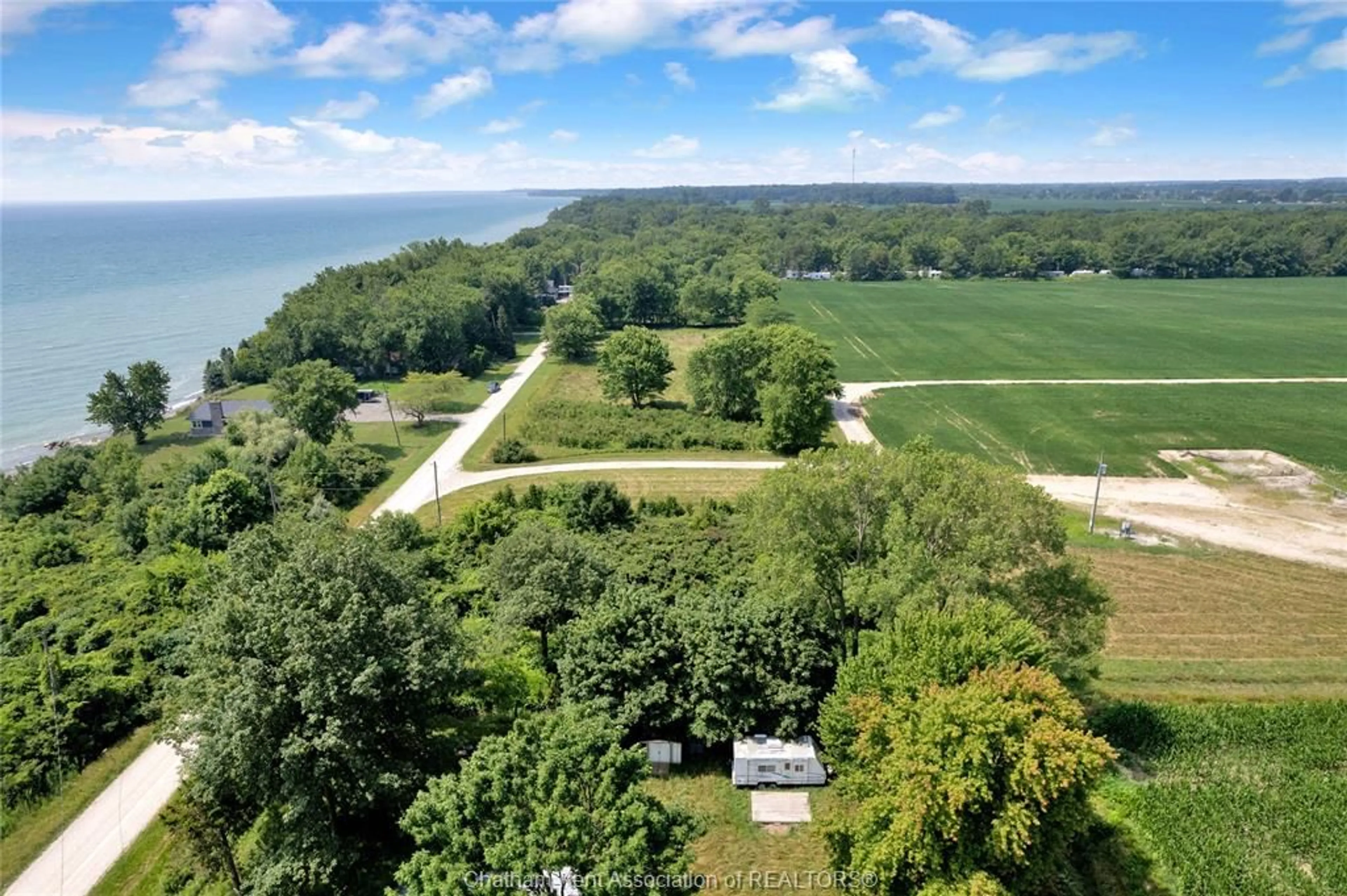 A pic from outside/outdoor area/front of a property/back of a property/a pic from drone, water/lake/river/ocean view for 1281 BLUFF Line, Wheatley Ontario N0P 2P0