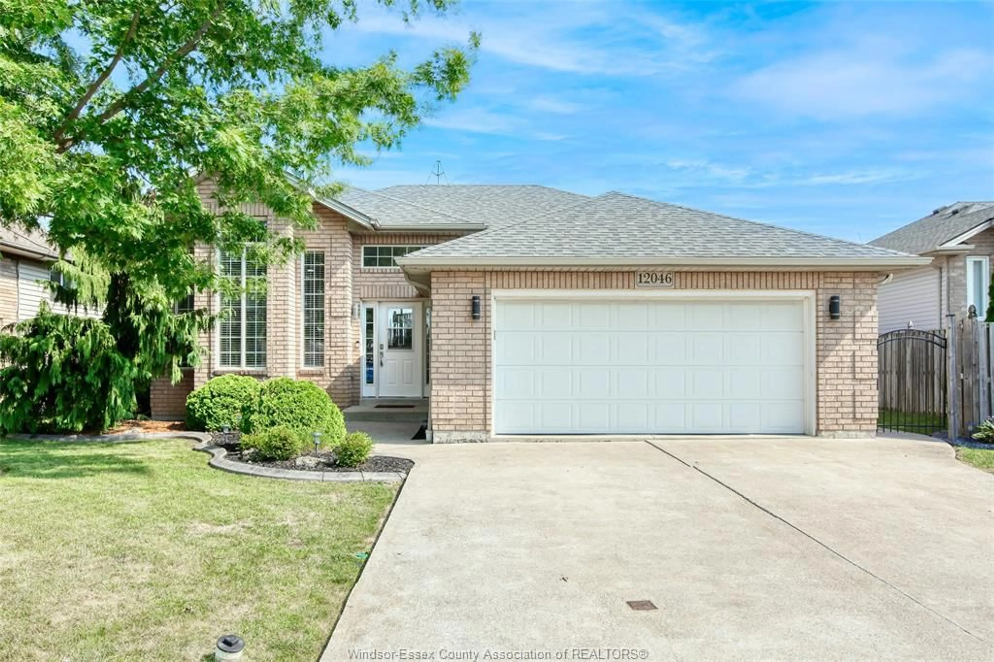 Home with brick exterior material, street for 12046 DUCHARME Lane, Essex Ontario N0R 1J0