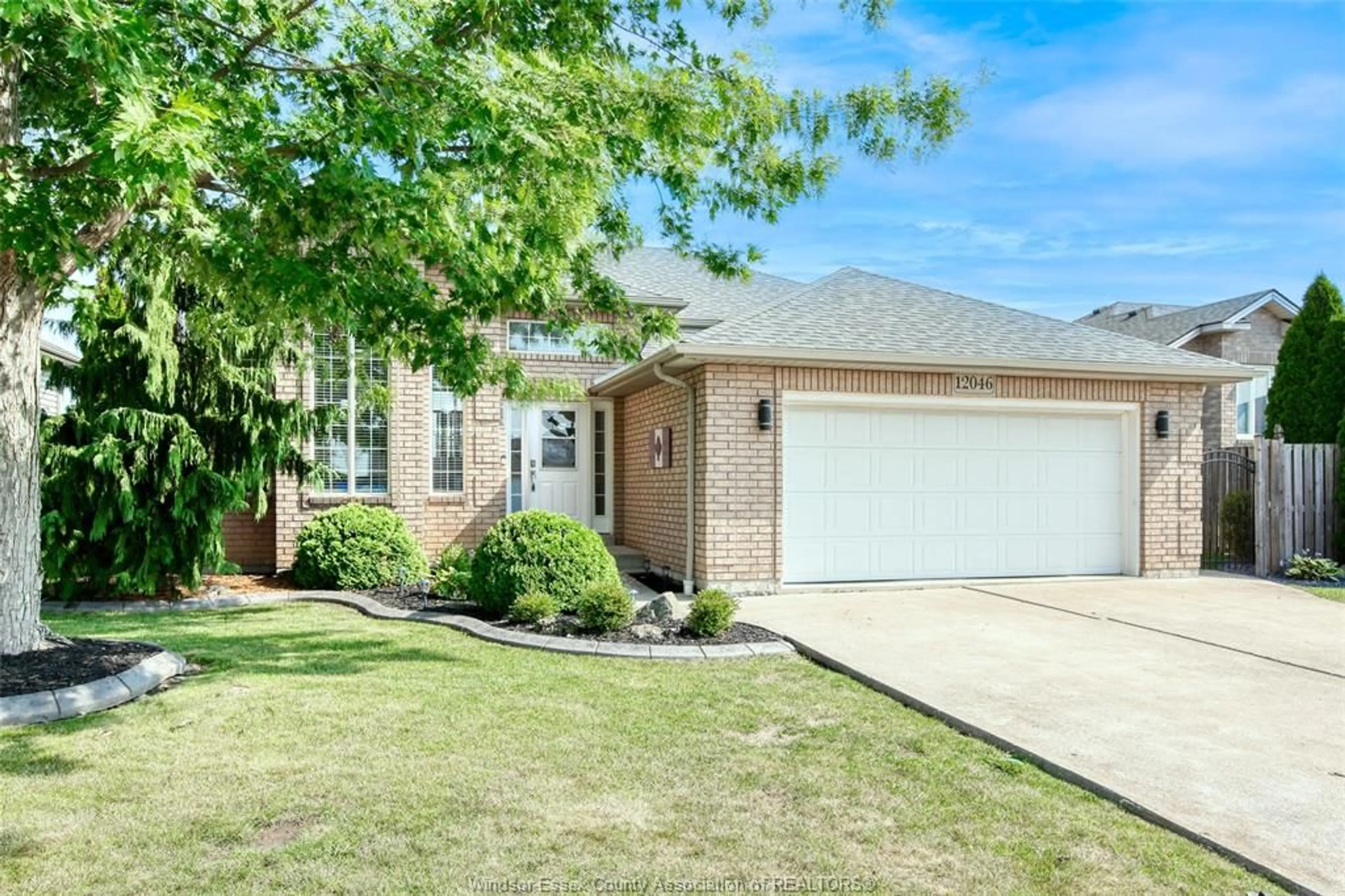 Home with brick exterior material, street for 12046 DUCHARME Lane, Essex Ontario N0R 1J0