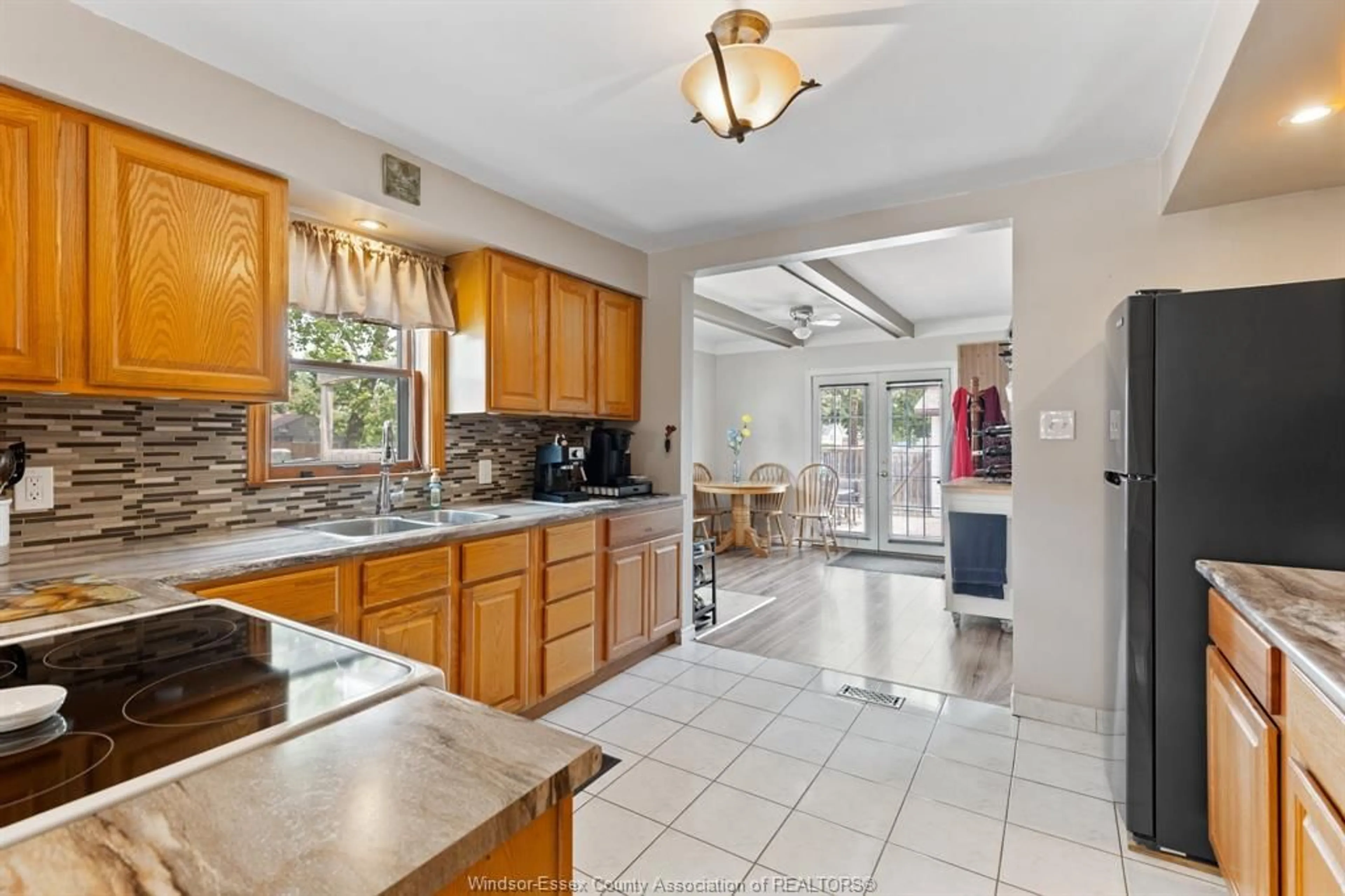 Open concept kitchen, ceramic/tile floor for 1702 ST. LUKE Rd, Windsor Ontario N8Y 3N6