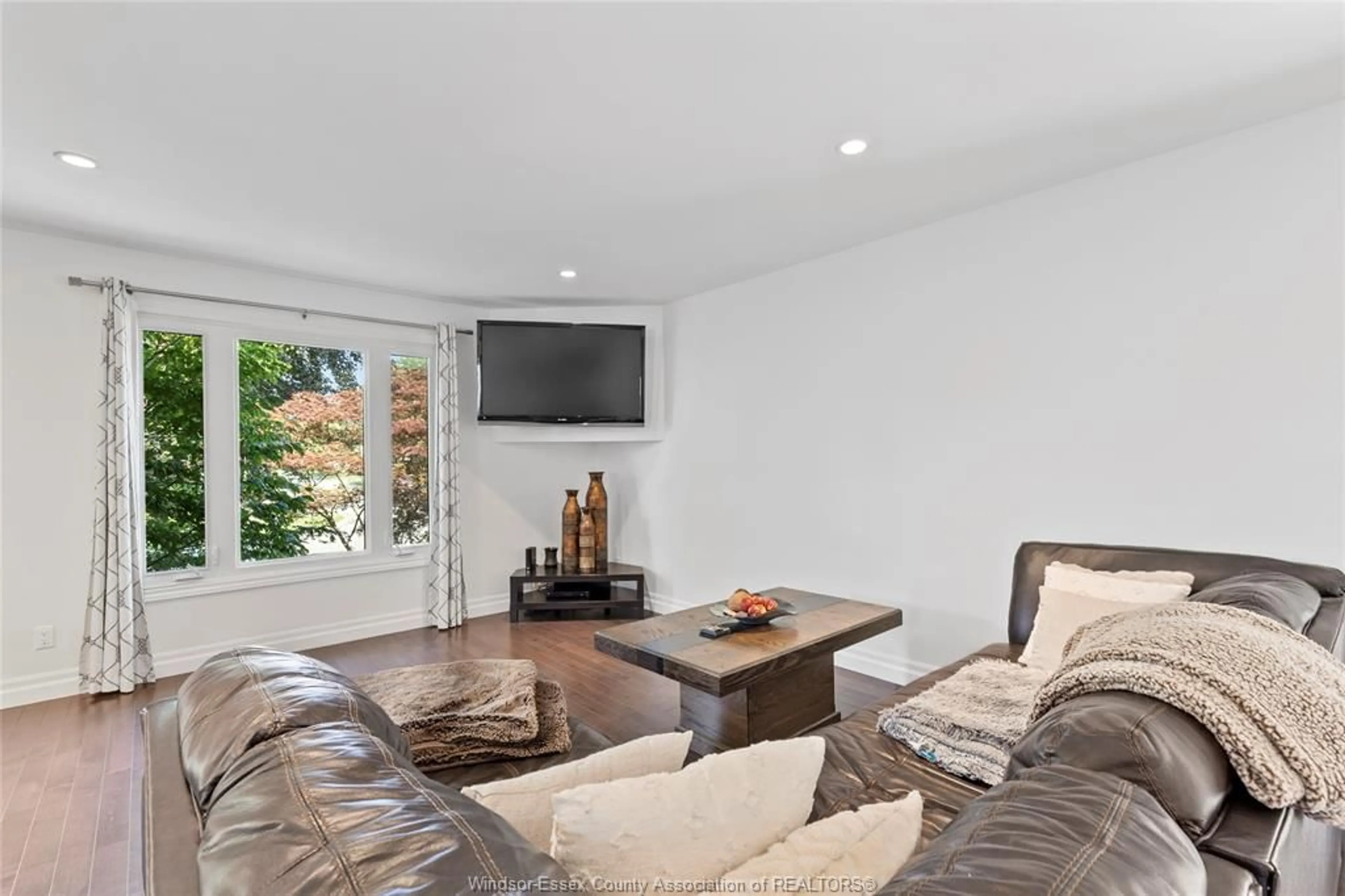 Living room with furniture, unknown for 18 Debergh Ave, Leamington Ontario N8H 4S9