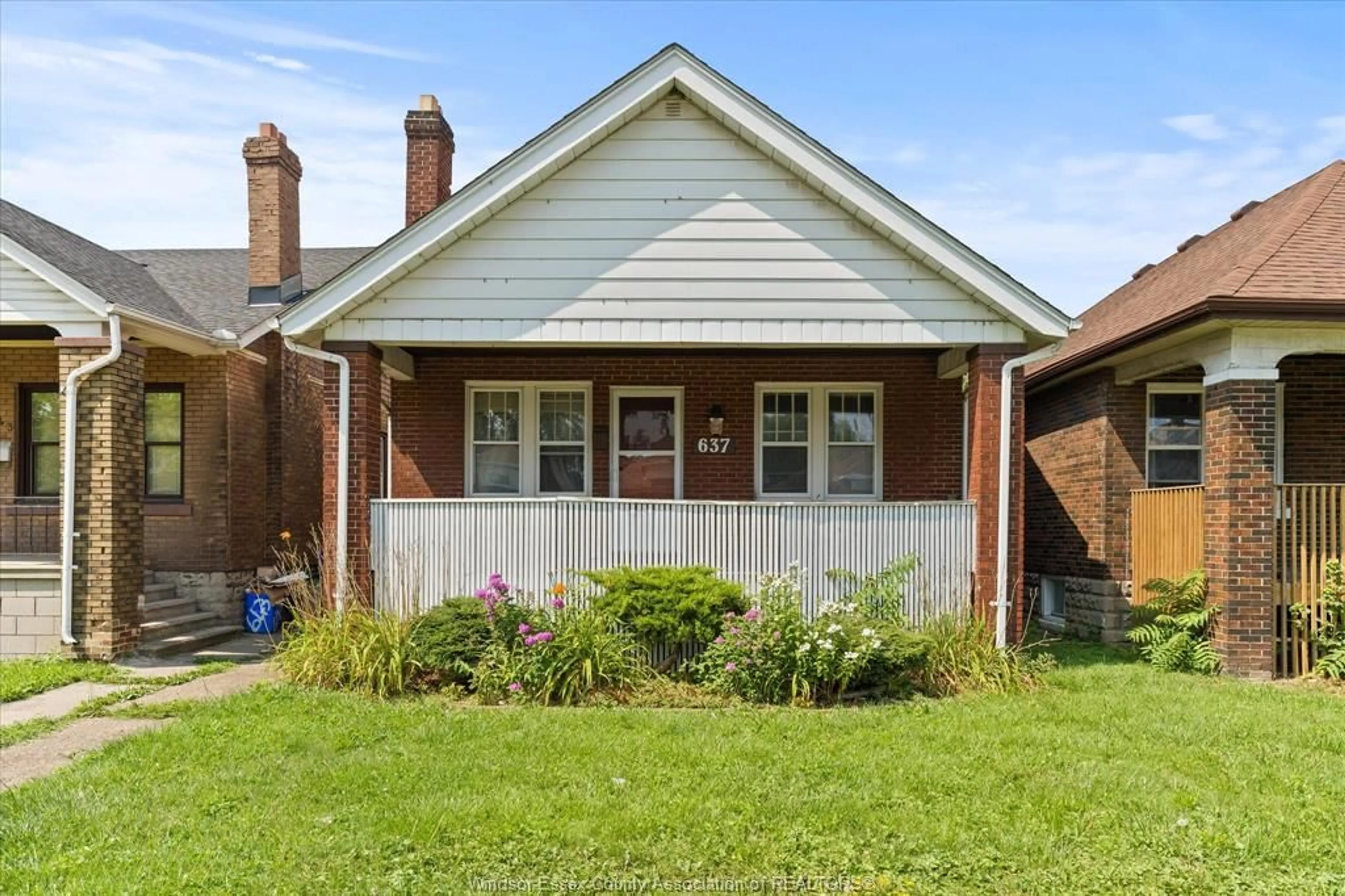 Home with brick exterior material, street for 637 Rankin, Windsor Ontario N9B 2R8