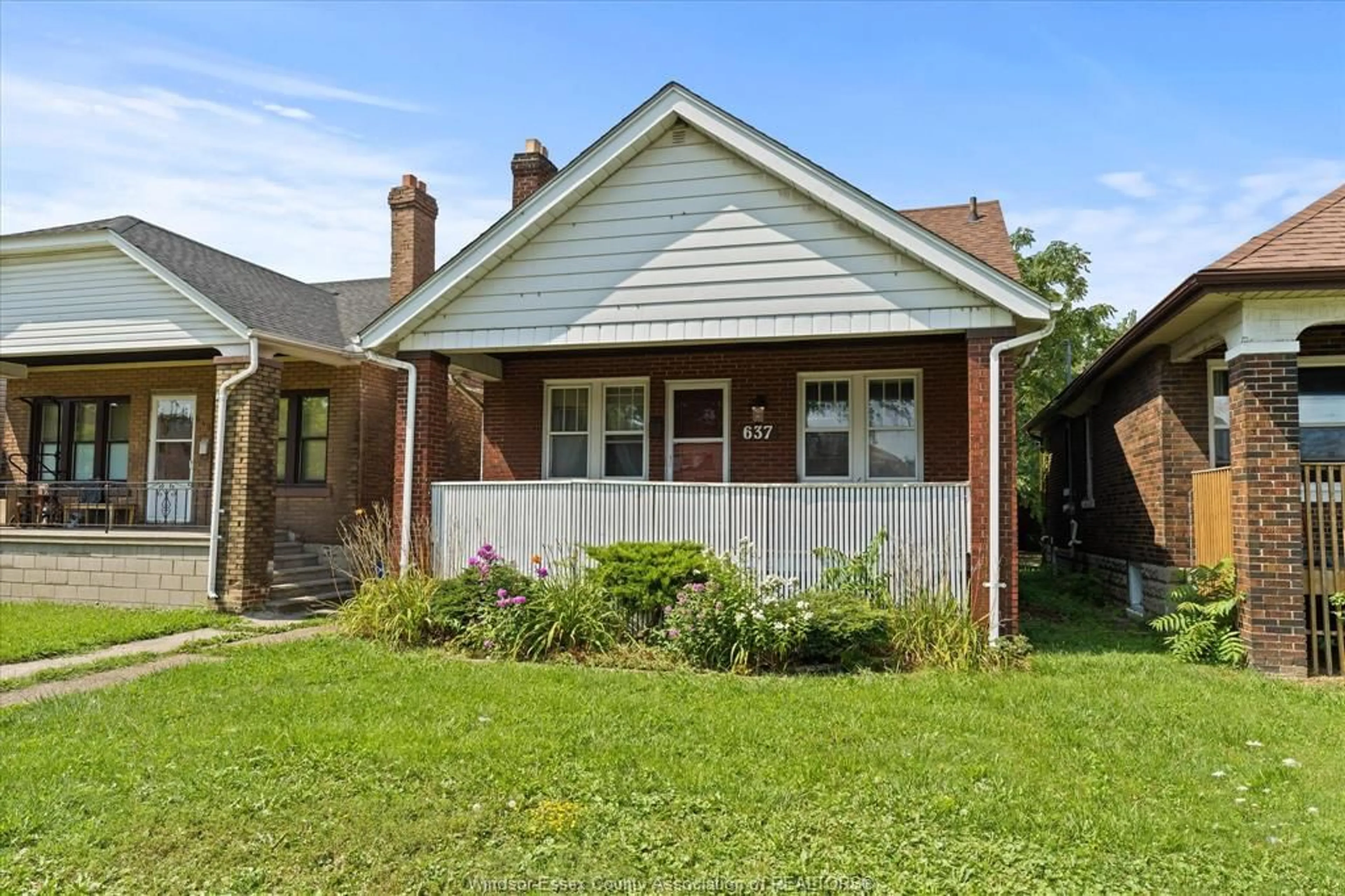 Home with brick exterior material, street for 637 Rankin, Windsor Ontario N9B 2R8