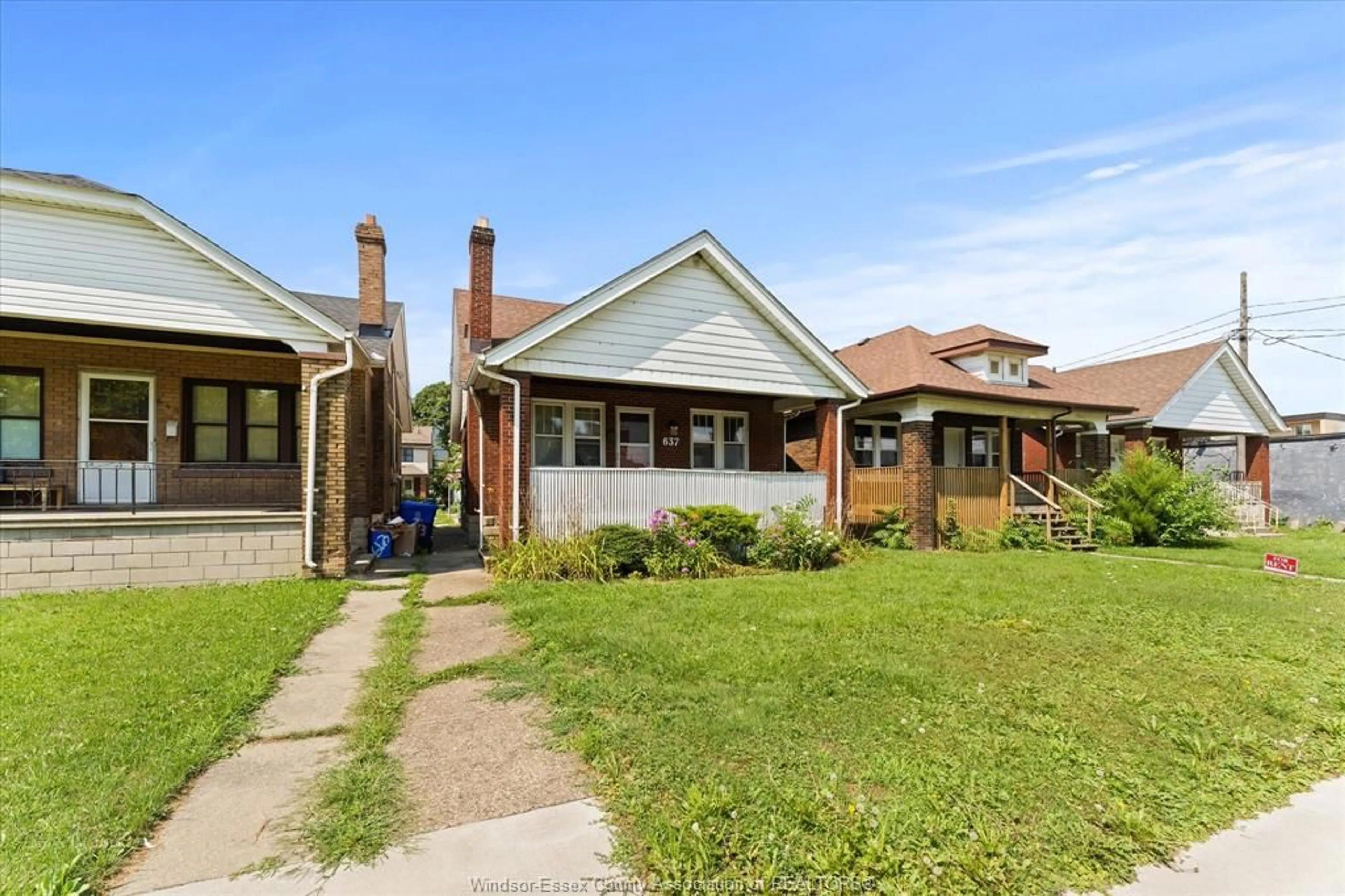 Home with brick exterior material, street for 637 Rankin, Windsor Ontario N9B 2R8